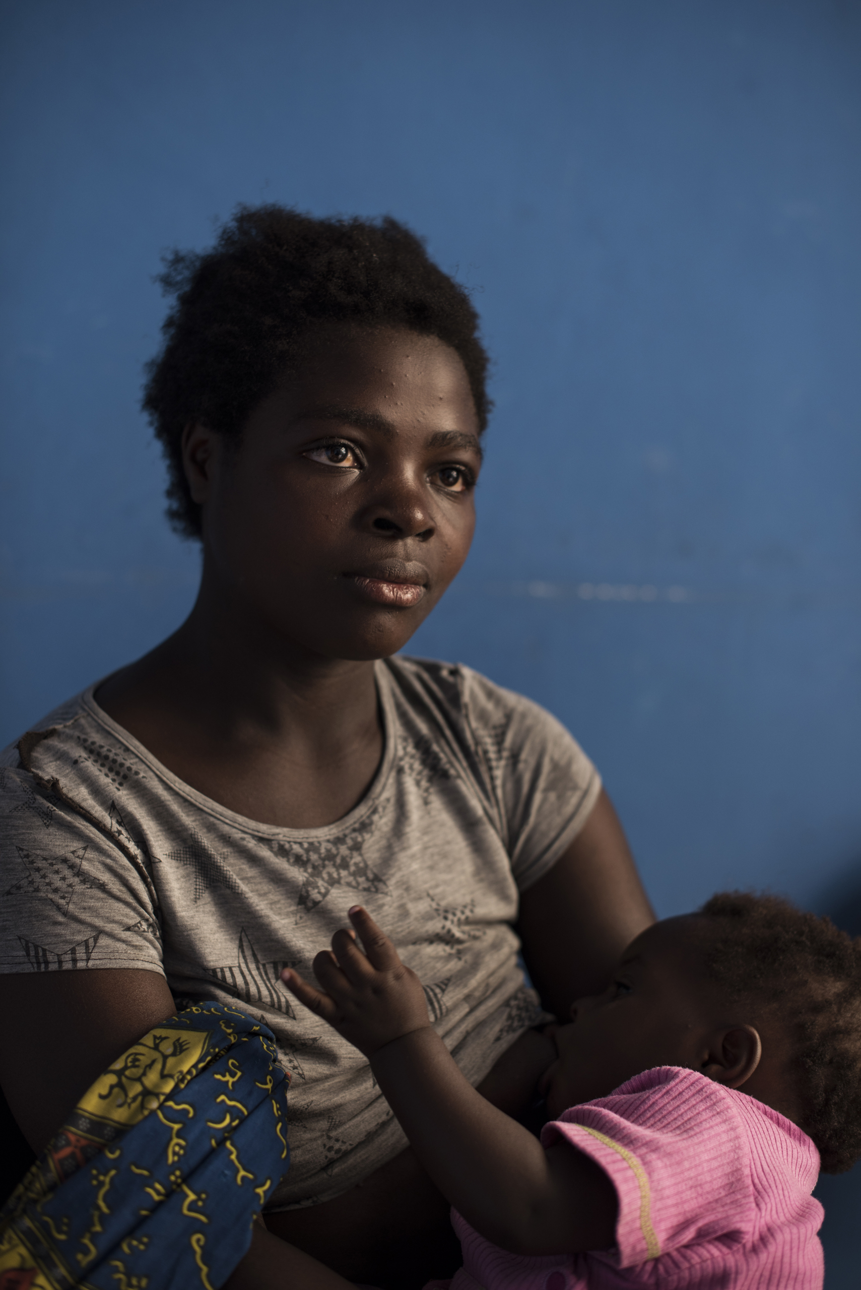 Riziki Helene Bazungo, 15, holds her 10 month old daughter, Sara Bazungo, who was born out of rape, Goma, Democratic Republic of Congo, Dec. 4, 2015.