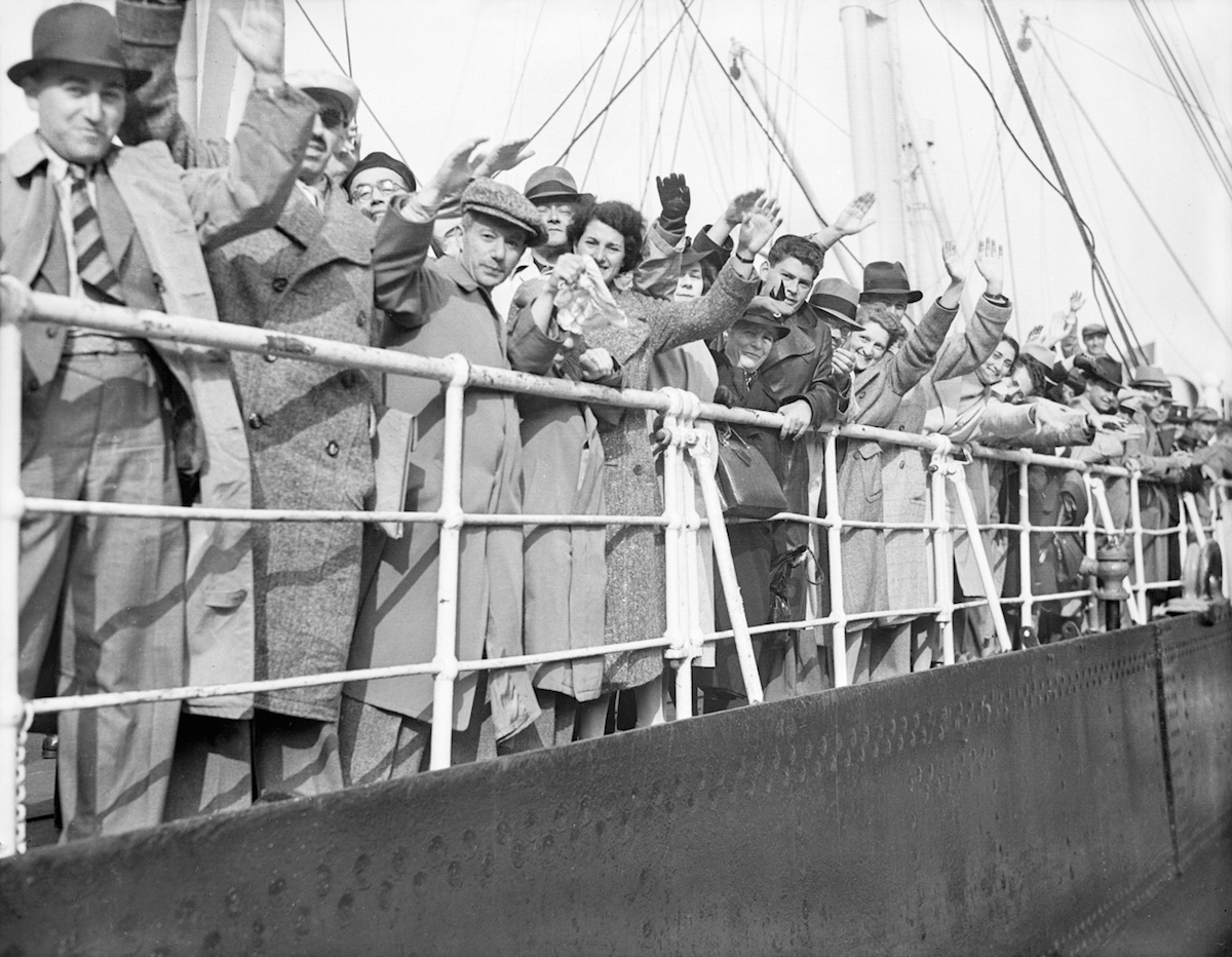 Hundreds of German-Jewish refugees, Britain's share of the 907 who sailed for weeks in search of a home, land at Southampton in 1939. (Planet News Archive / SSPL / Getty Images)