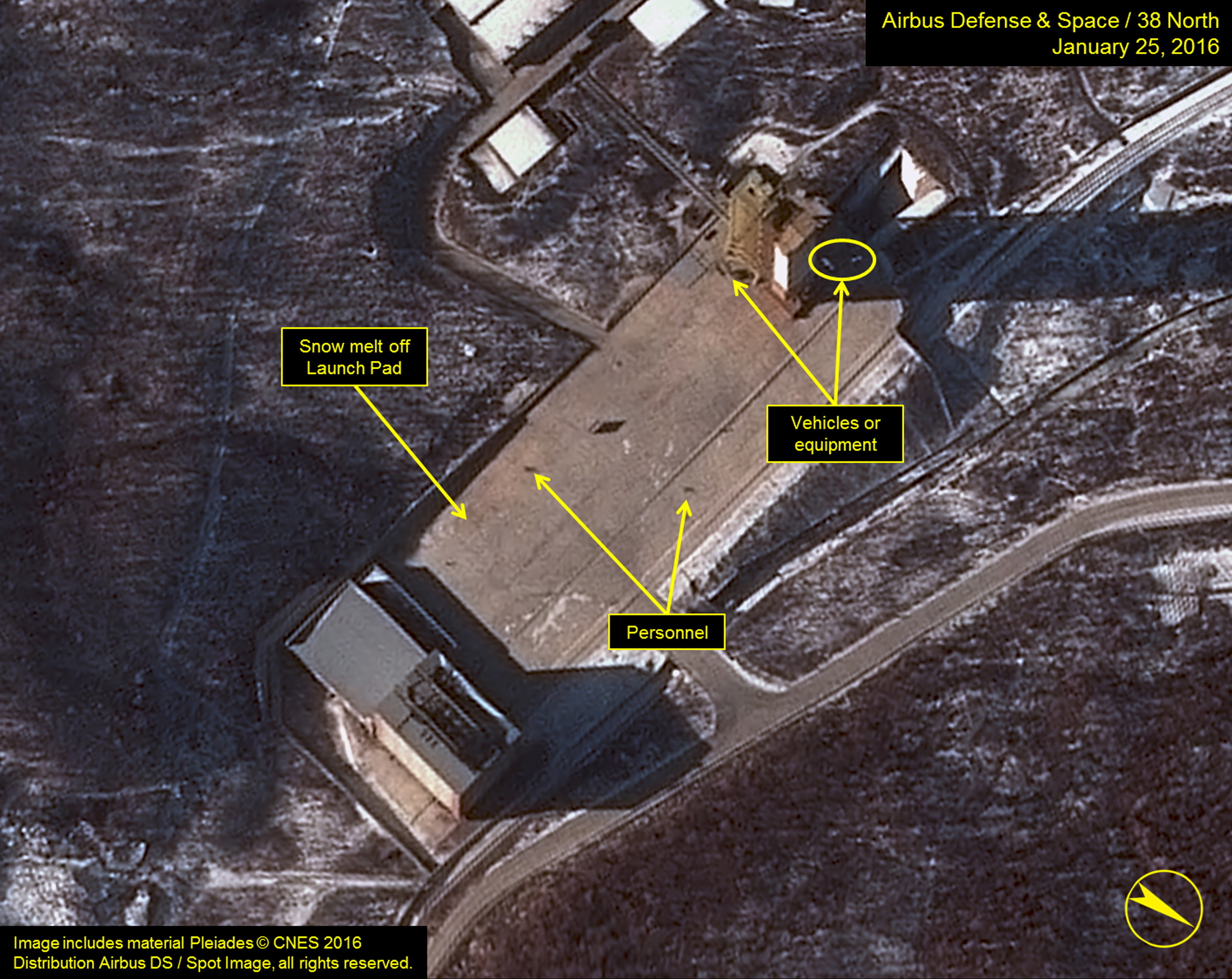 Airbus Defense &amp; Space and 38 North satellite image shows three objects at the base of the gantry tower that are either vehicles or equipment at Sohae Satellite Launching Station in North Korea