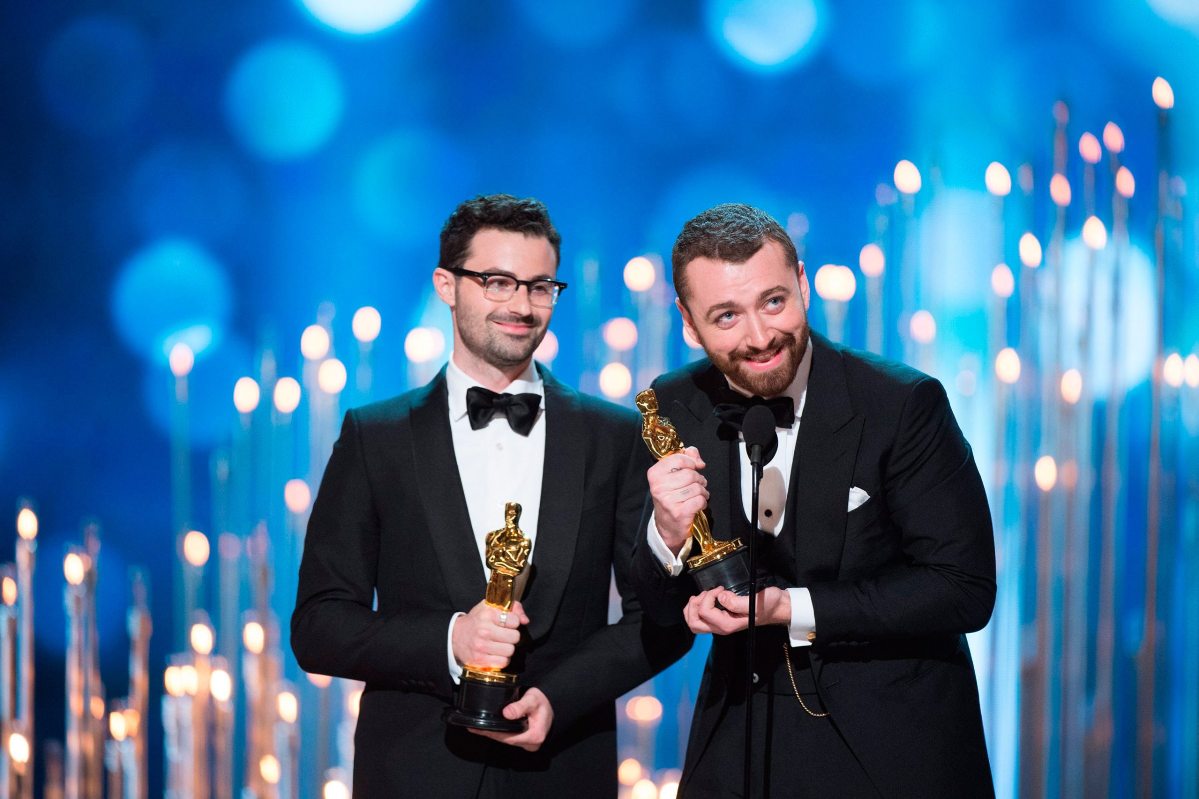 A handout image provided by the Academy of Motion Picture Arts and Science shows Jimmy Napes (left) and Sam Smith (right) accepting the Oscar for Best Original Song for "Writing's On The Wall" from SPECTRE during the 88th annual Academy Awards ceremony at the Dolby Theatre in Hollywood, Calif., Feb. 28, 2016.