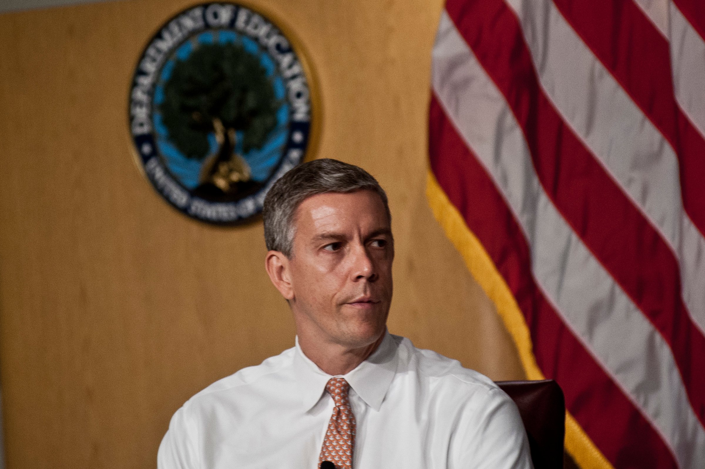 Arne Duncan at the "Let's Read. Let's Move" summer reading event series in Washington on July 18, 2012.