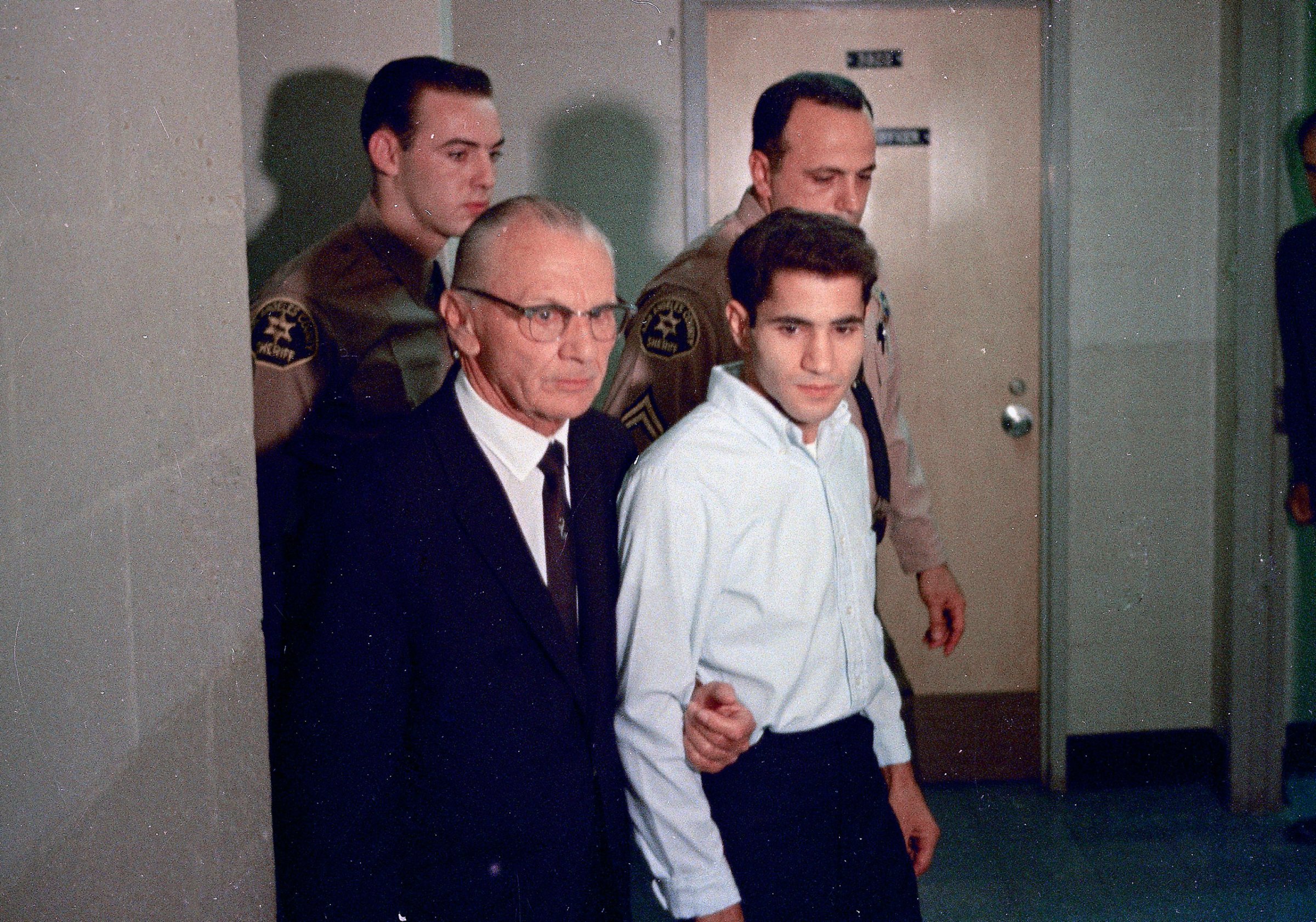 In this June 1968 file photo, Sirhan Sirhan, right, the assassin of Sen. Robert F. Kennedy, is seen with his attorney Russell E. Parsons in Los Angeles.