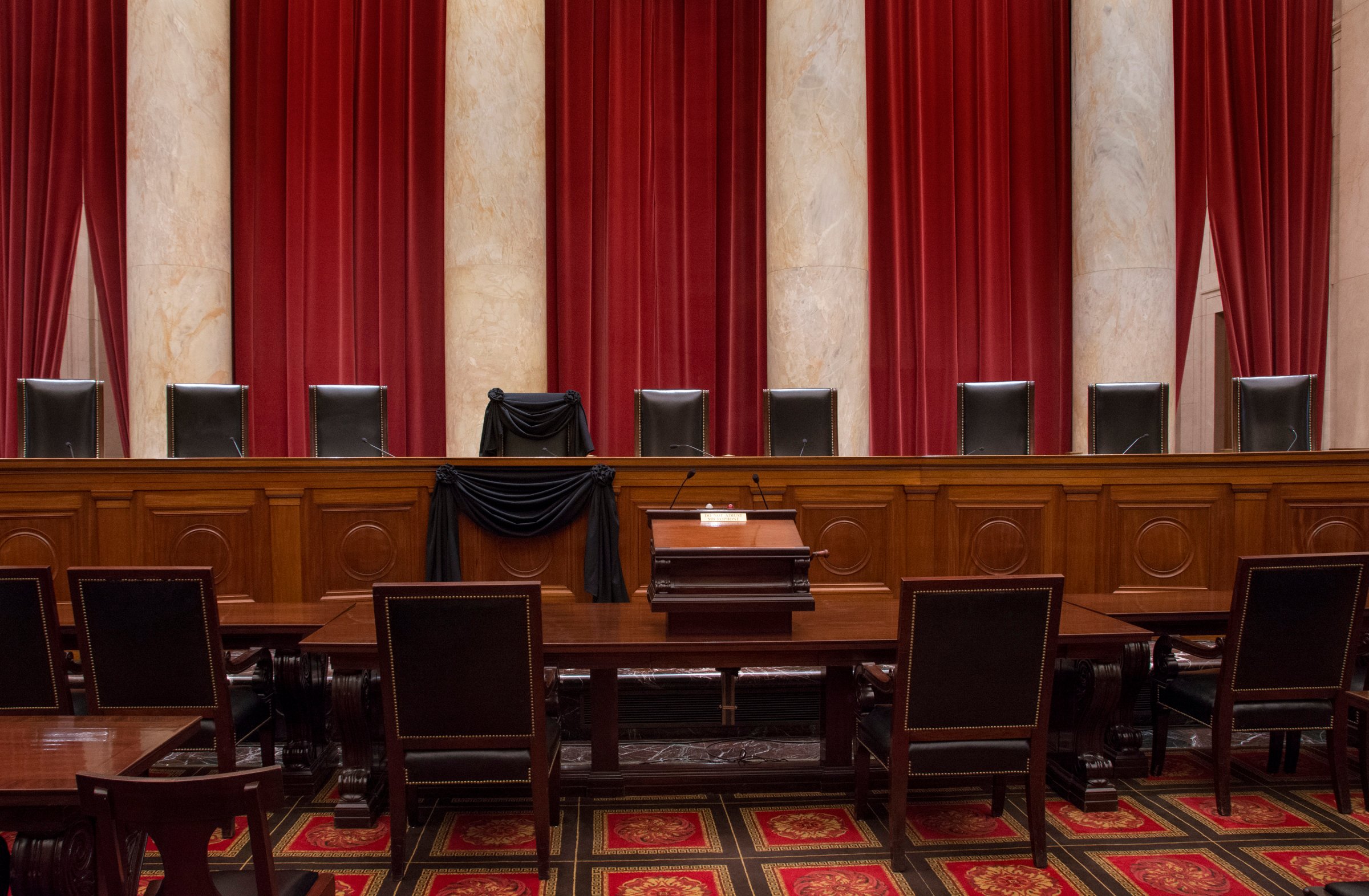 Associate Justice Antonin Scalia’s bench chair and the bench in front of his seat are draped in black in the Courtroom of the Supreme Court following his Feb. 13, 2016 death.
