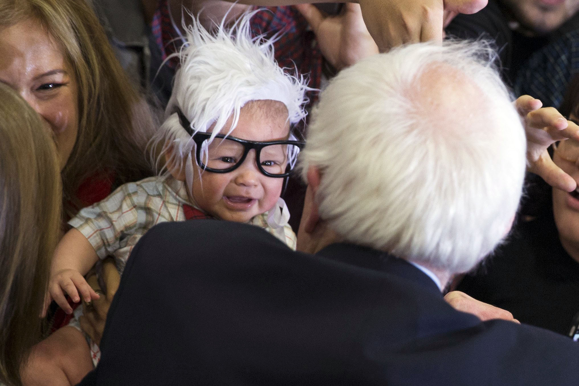 Democratic presidential candidate Sen. Bernie Sanders, I-Vt., meets 3-month-old Oliver Lomas, of Venice, Calif., during a rally at Bonanza High School, on Feb. 14, 2016, in Las Vegas.