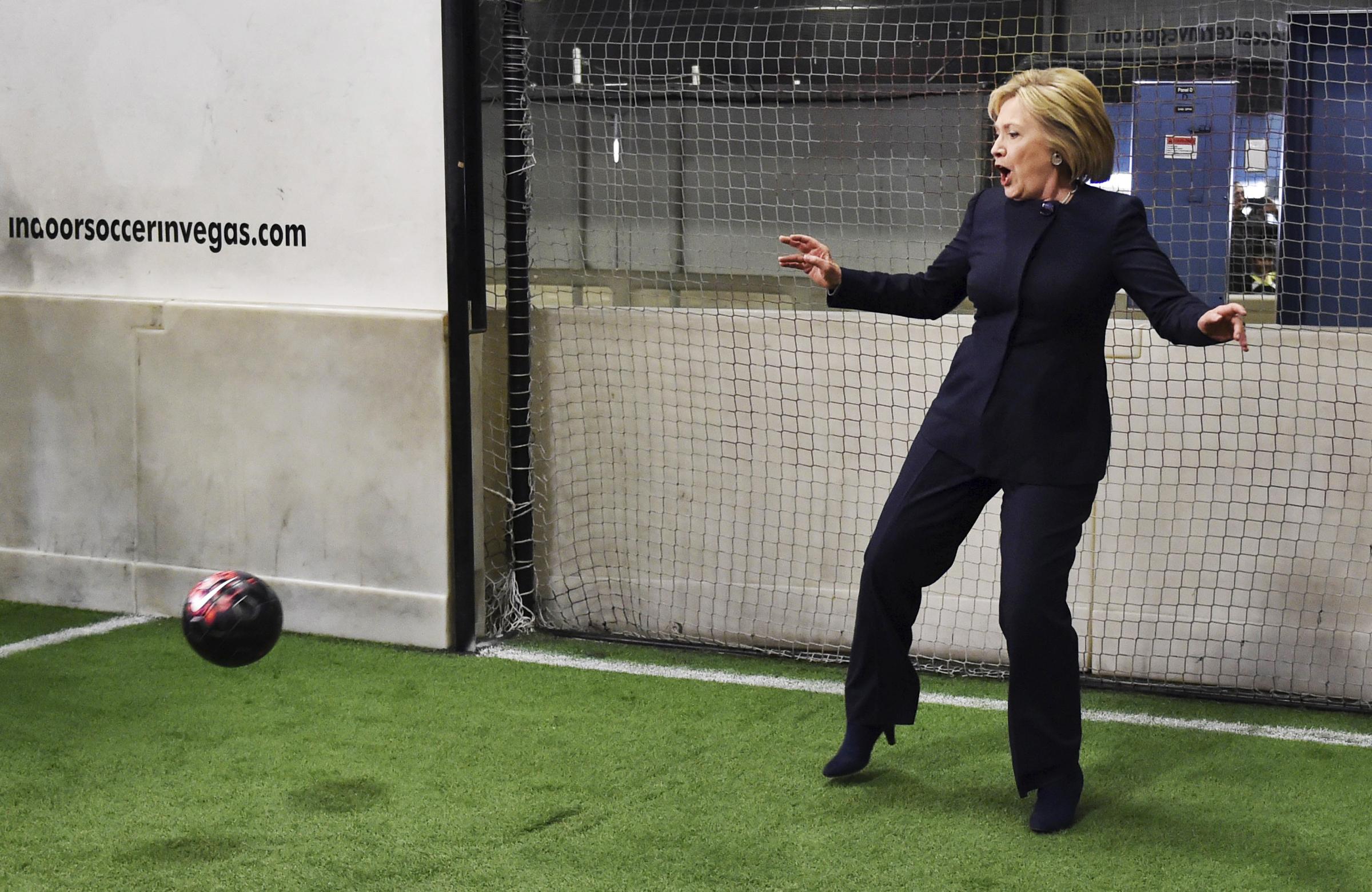 Democratic presidential candidate Hillary Clinton defends a goal during a campaign stop at an indoor soccer center in Las Vegas on Feb. 13, 2016.