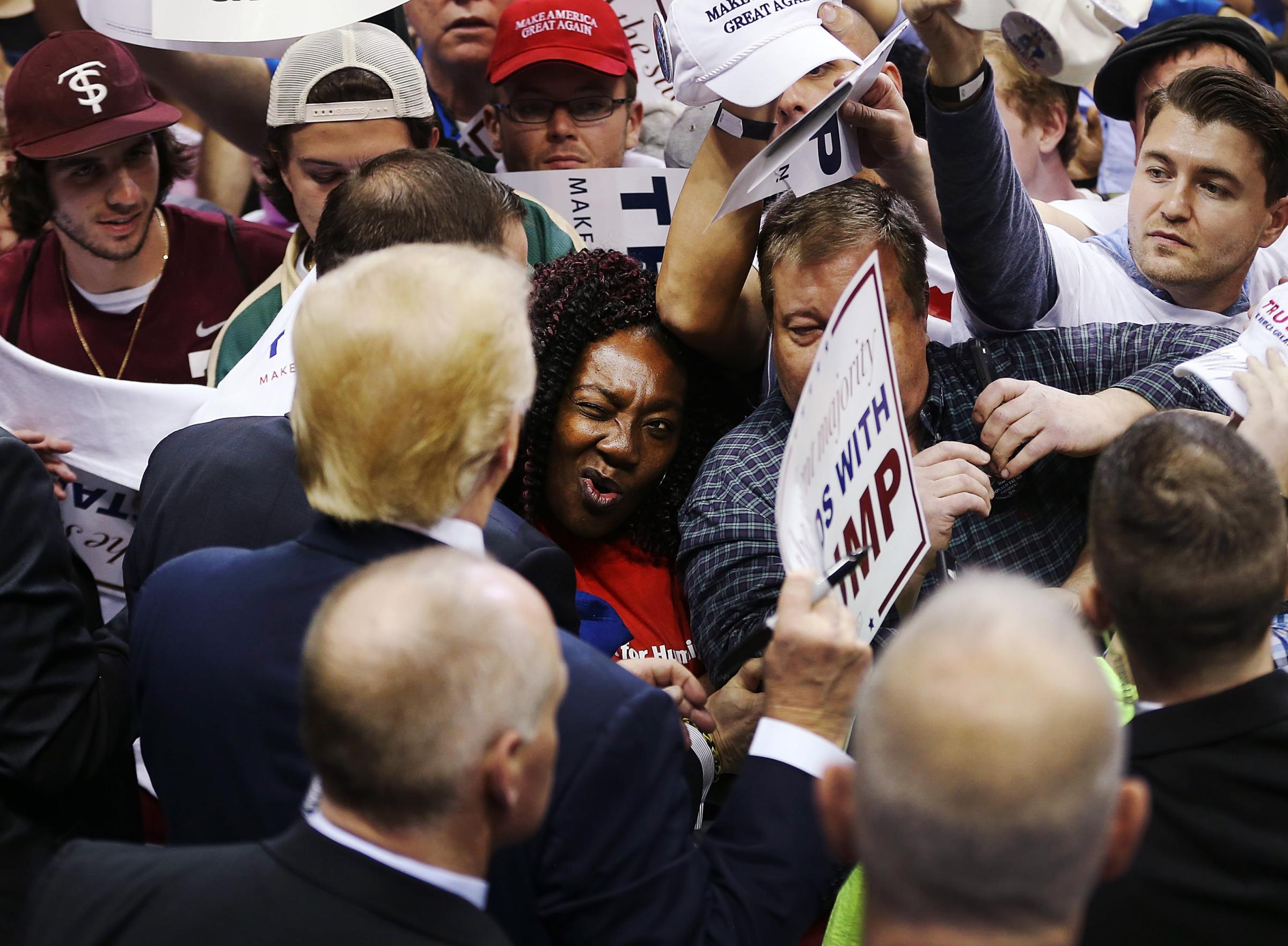 Republican presidential candidate Donald Trump greets people during a campaign rally at the University of South Florida Sun Dome on Feb. 12, 2016 in Tampa, Fla.