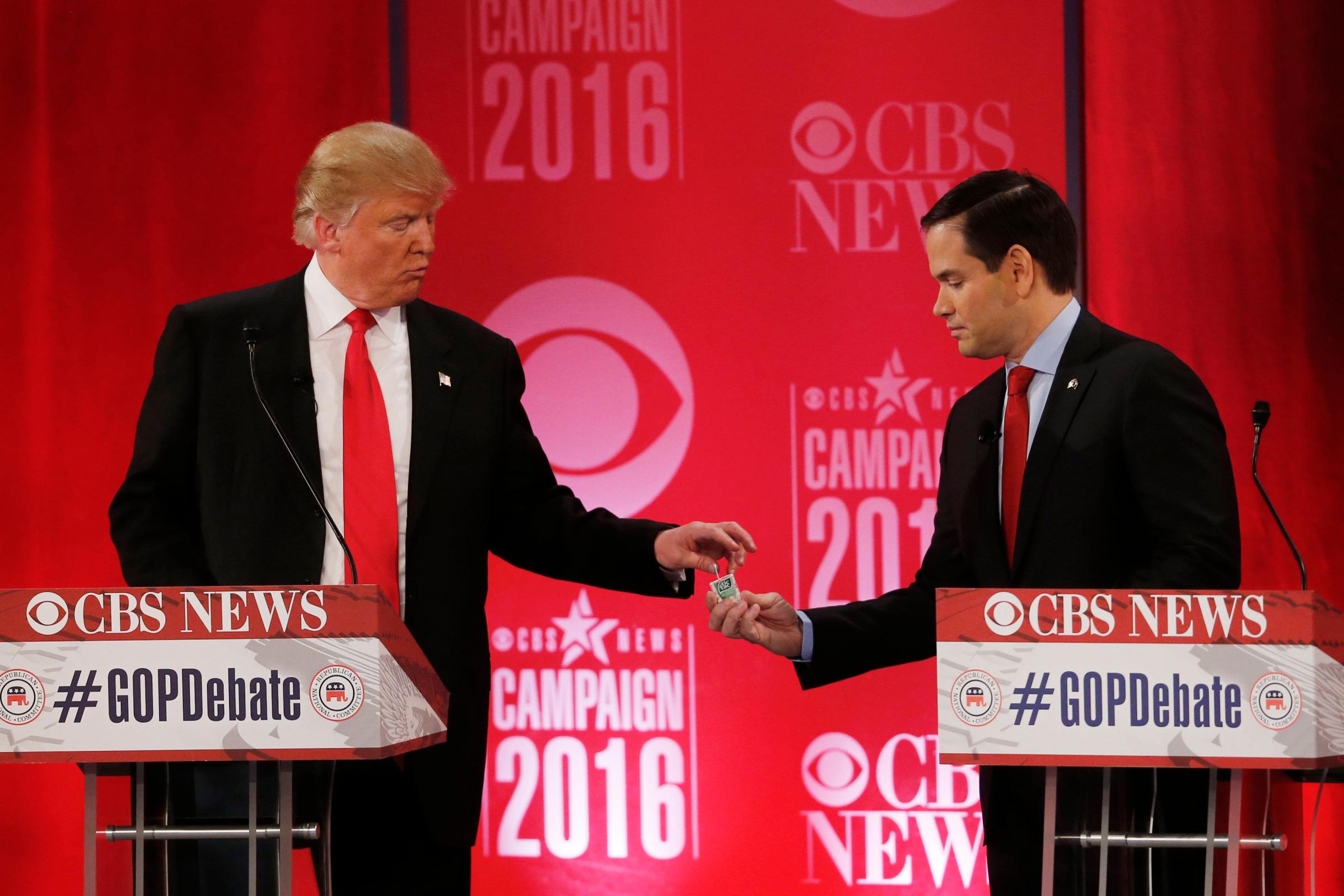 Republican presidential candidate, Sen. Marco Rubio, R-Fla., shares a Tic-Tac mint with Republican presidential candidate, businessman Donald Trump during a Republican presidential debate at the Peace Center on Feb. 13, 2016, in Greenville, S.C.
