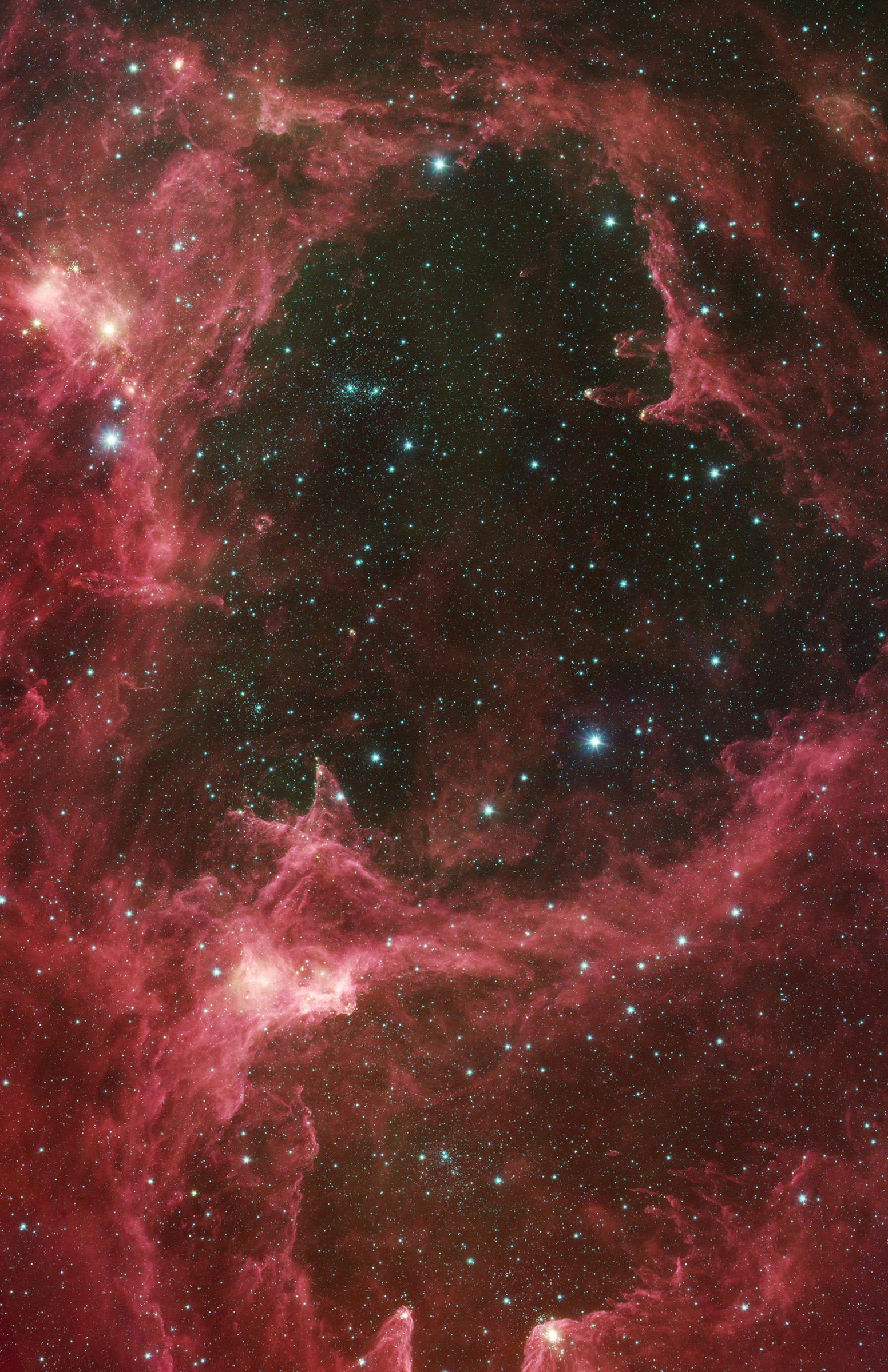 Generations of stars can be seen in this infrared portrait from NASA's Spitzer Space Telescope released in Aug. 2008. This image contains some of the best evidence yet for the triggered star-formation theory.
