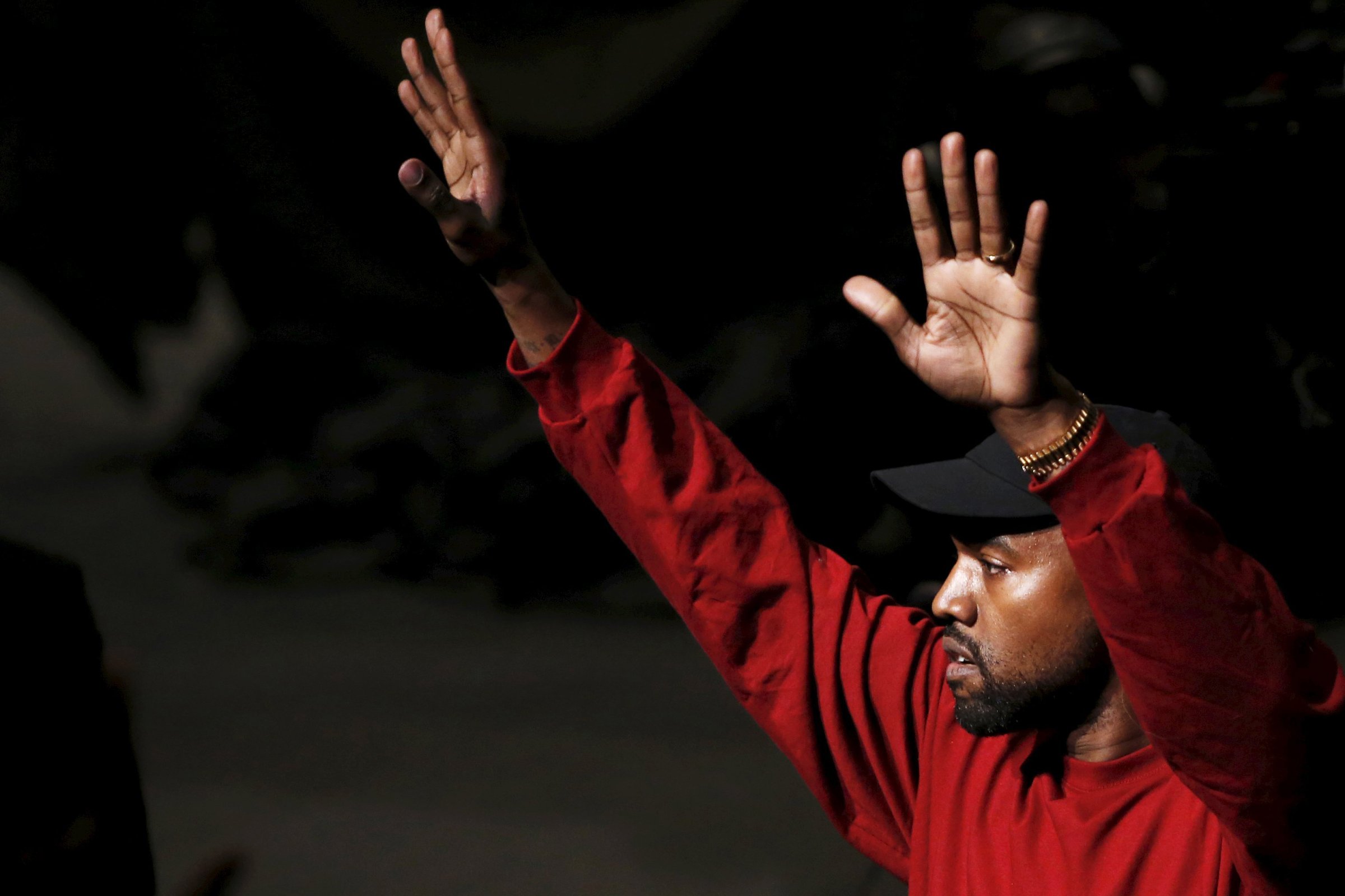 Kanye West acknowledges attendees during his Yeezy Season 3 Collection presentation and listening party at New York Fashion Week on Feb. 11, 2016. Hillary Clinton Democratic Debate