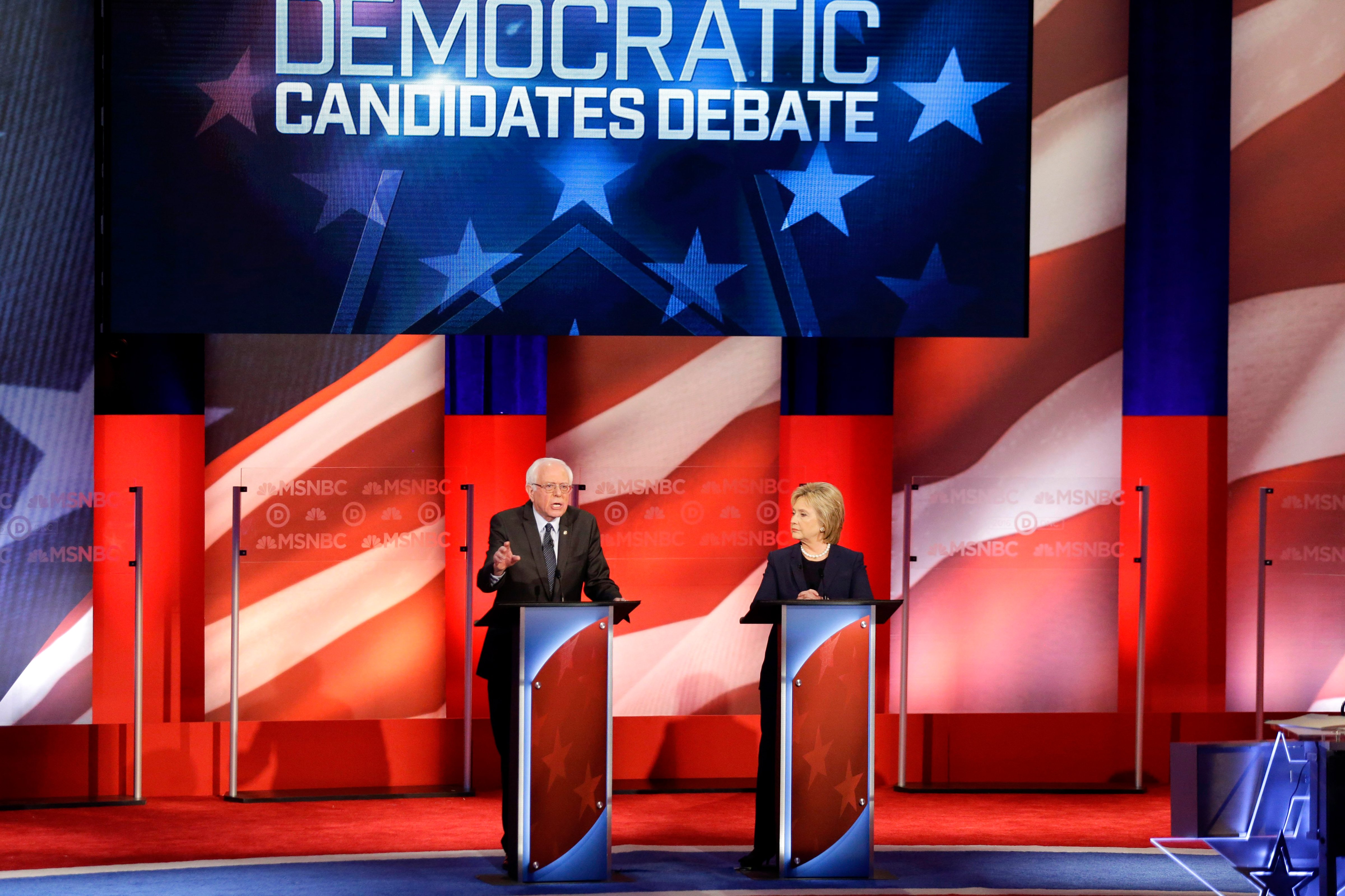 Democratic presidential candidates former Secretary of State Hillary Clinton and U.S. Sen. Bernie Sanders (I-VT) appear at a Democratic debate at the University of New Hampshire on Feb. 4, 2016 in Durham, N.H. (David Goldman—AP)