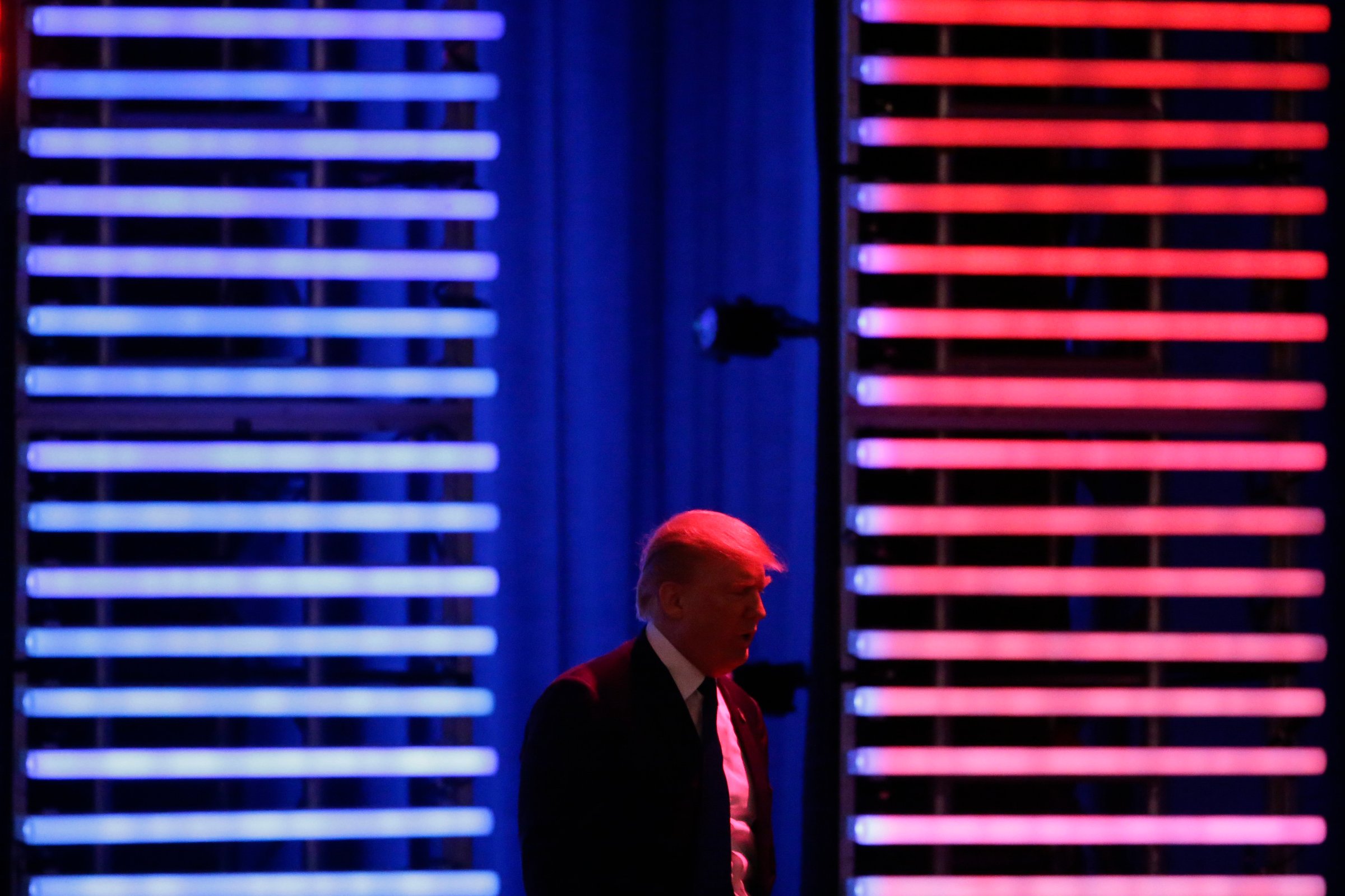 Republican presidential candidate, businessman Donald Trump walks on stage during a Republican presidential primary debate hosted by ABC News at the St. Anselm College on Saturday, Feb. 6, 2016, in Manchester, N.H.