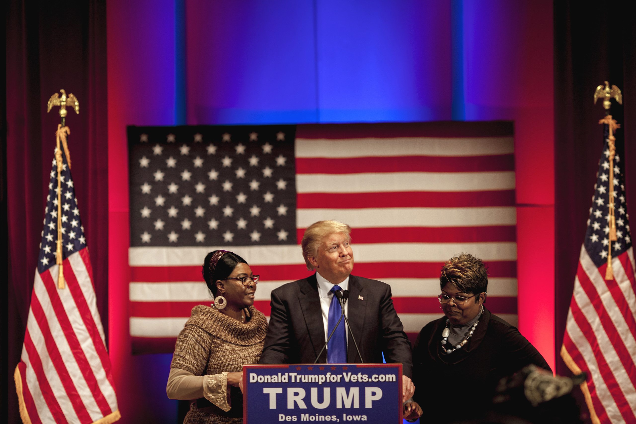 Donald Trump appears with supporters Diamond and Silk at benefit and rally for Wounded Warriors, a charity organization for Veterans,  at Drake University in Des Moines, Iowa, on Thursday, Jan. 28, 2016. The event was timed to coincide with the Republican debates on Fox which he declined to attend. (Natalie Keyssar for TIME)