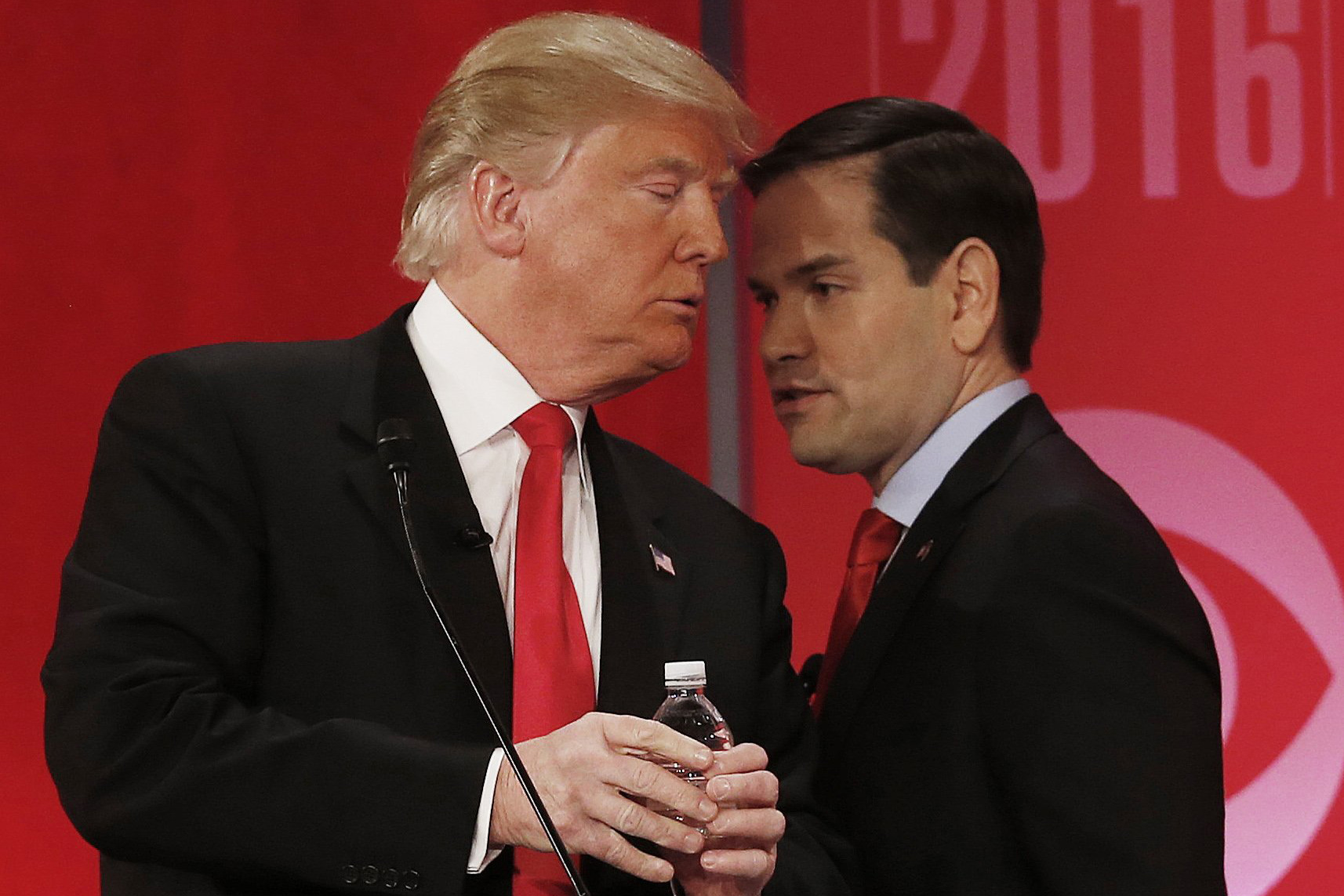 Republican presidential candidate, Sen. Marco Rubio, right, speaks to Republican presidential candidate Donald Trump during the CBS News Republican presidential debate at the Peace Center in Greenville, S.C., Feb. 13, 2016. (John Bazemore—AP)