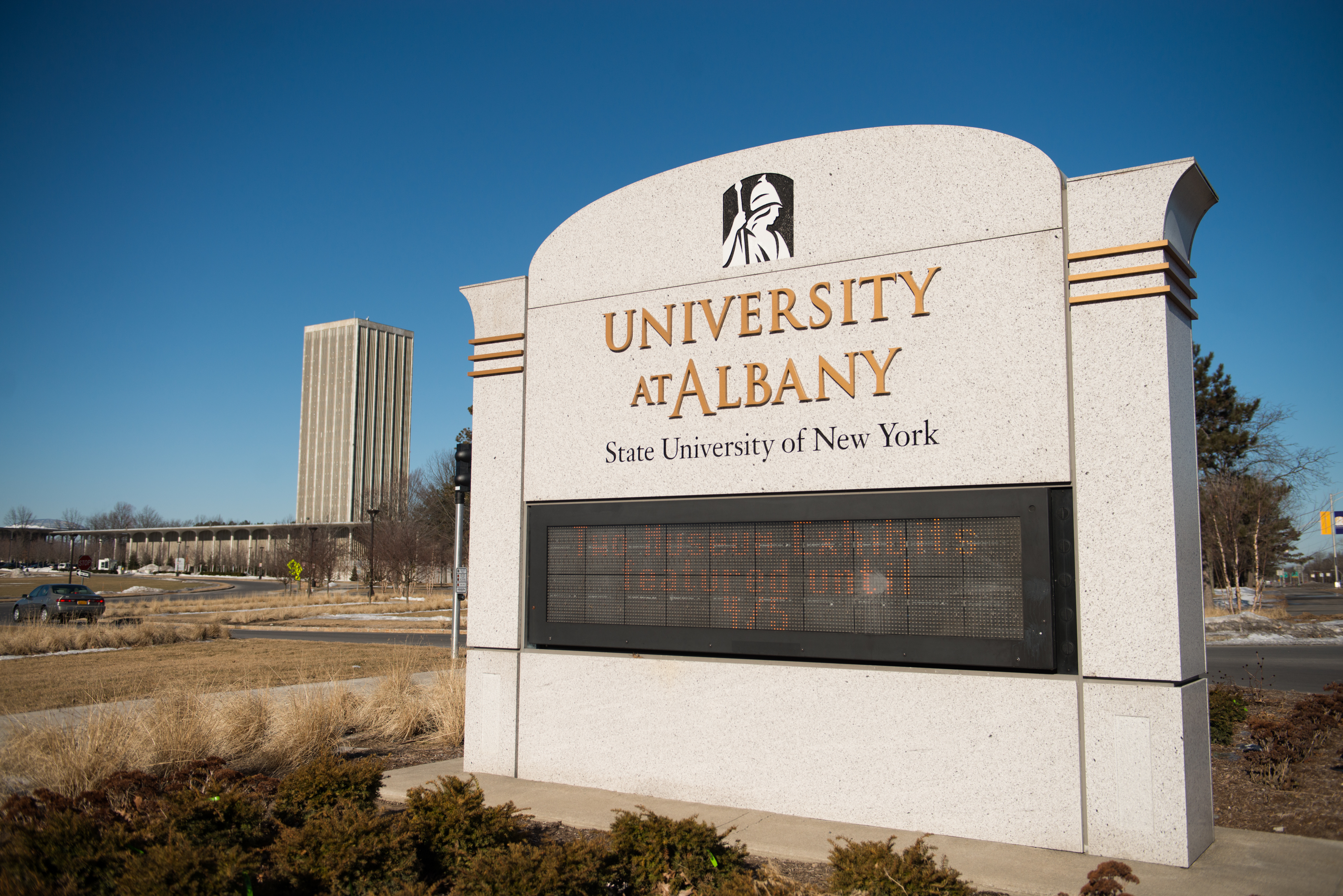 A University at Albany State University of New York (SUNY) sign stands in Albany, New York, U.S., on March 19, 2014. (Bloomberg—Bloomberg/Getty Images)