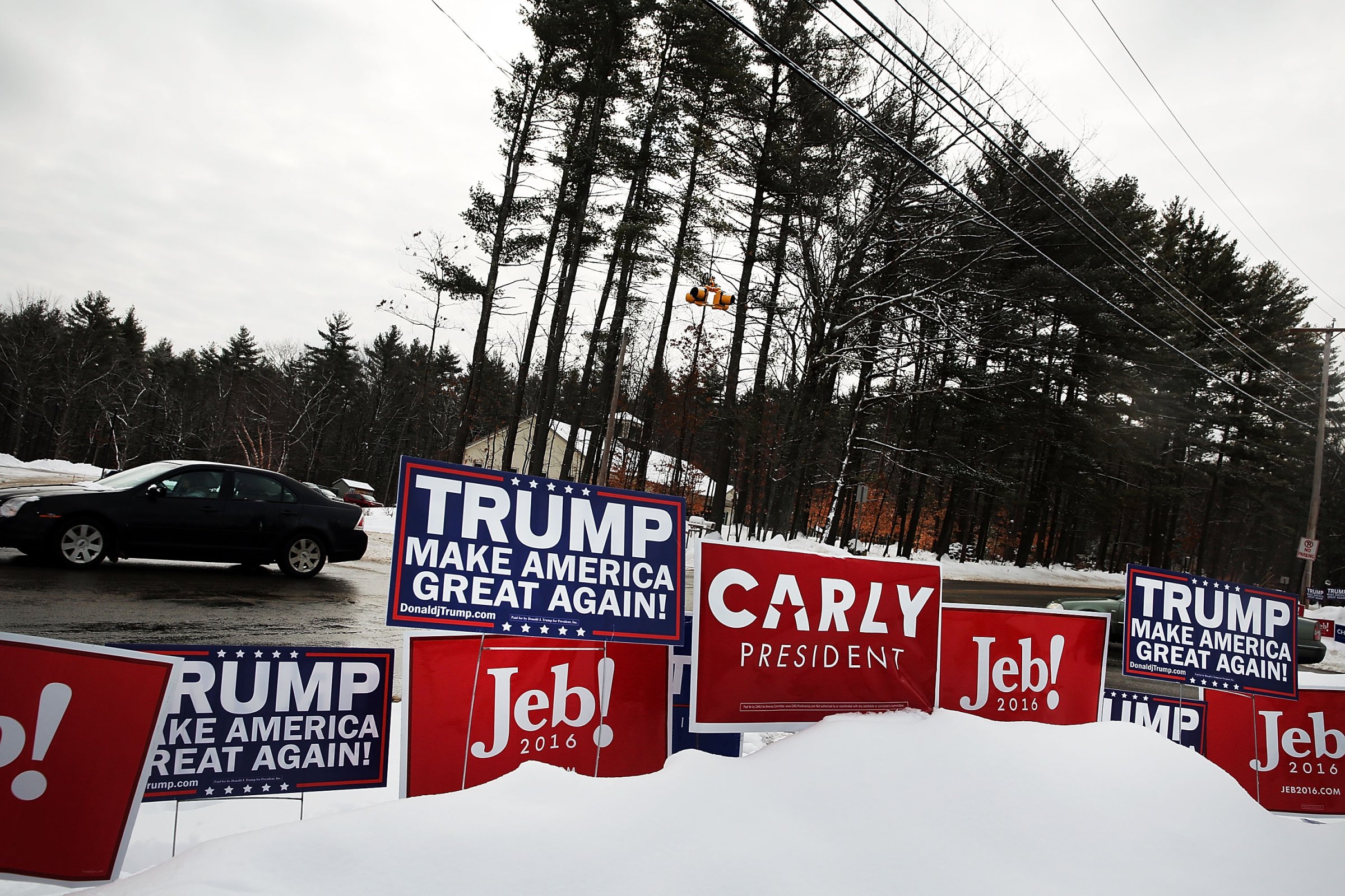 Candidate signs are displayed in front of a middle school serving as a voting station on the day of the New Hampshire Primary on February 9, 2016 in Bow, New Hampshire.