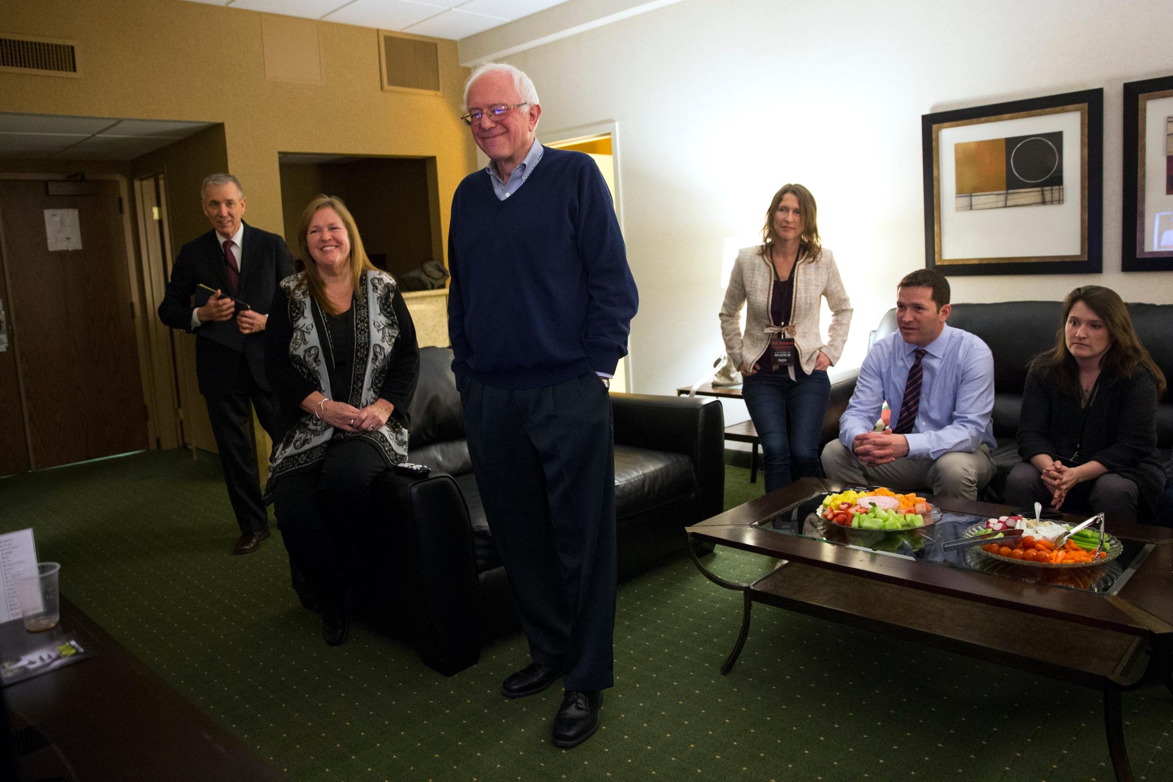 Democratic presidential candidate Sen. Bernie Sanders, I-Vt., watches caucus returns in his hotel room, on Feb. 1, 2016 in Des Moines, Iowa.