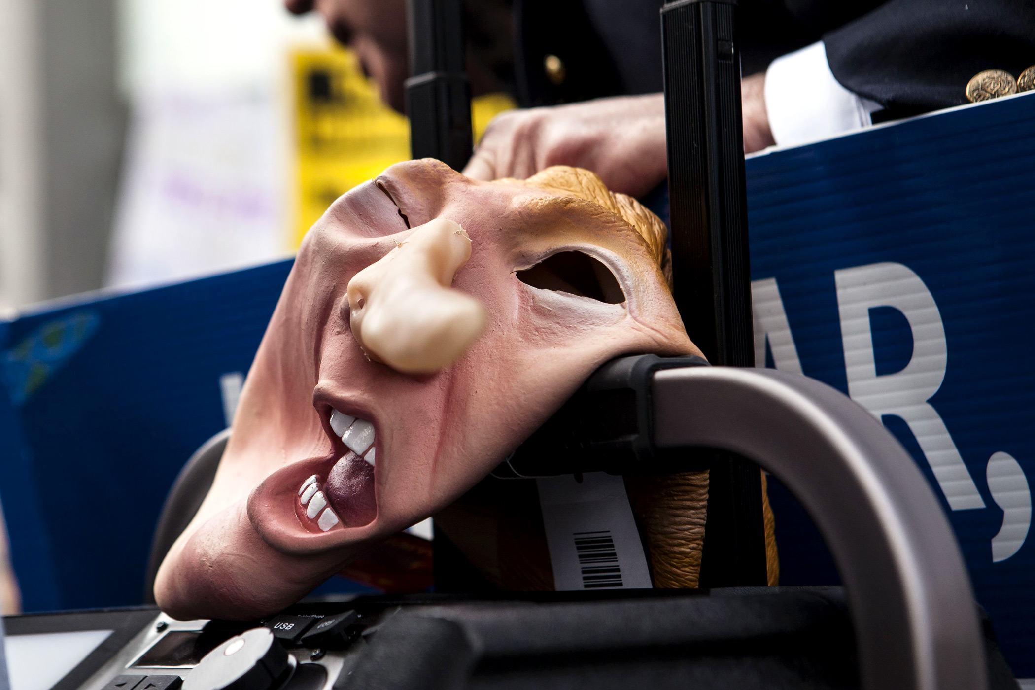A mask in the likeness of Donald Trump is seen at a protest in New York on March 19.