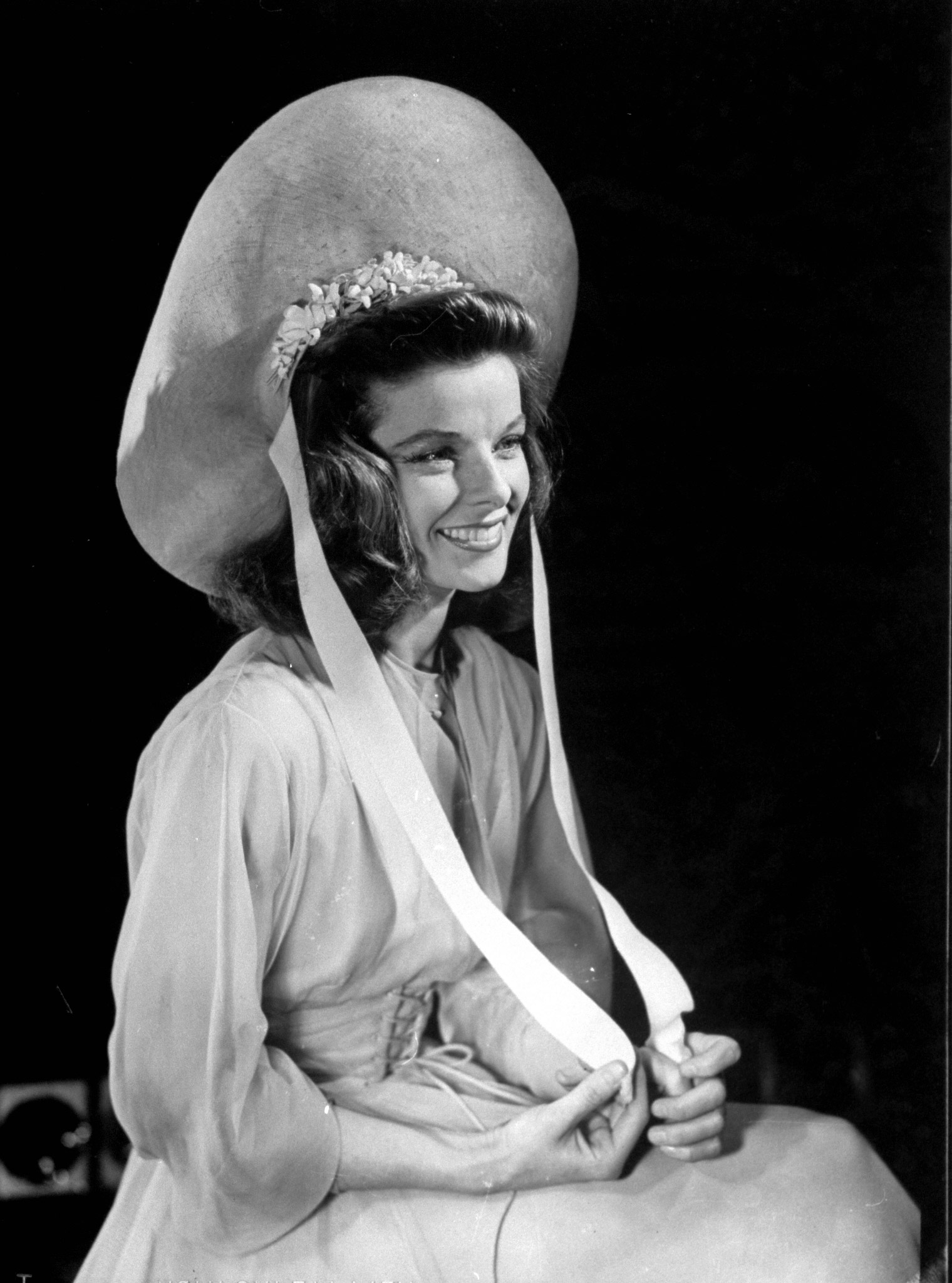 Katharine Hepburn wearing a hat on the set of her Broadway play "The Philadelphia Story." 1939.