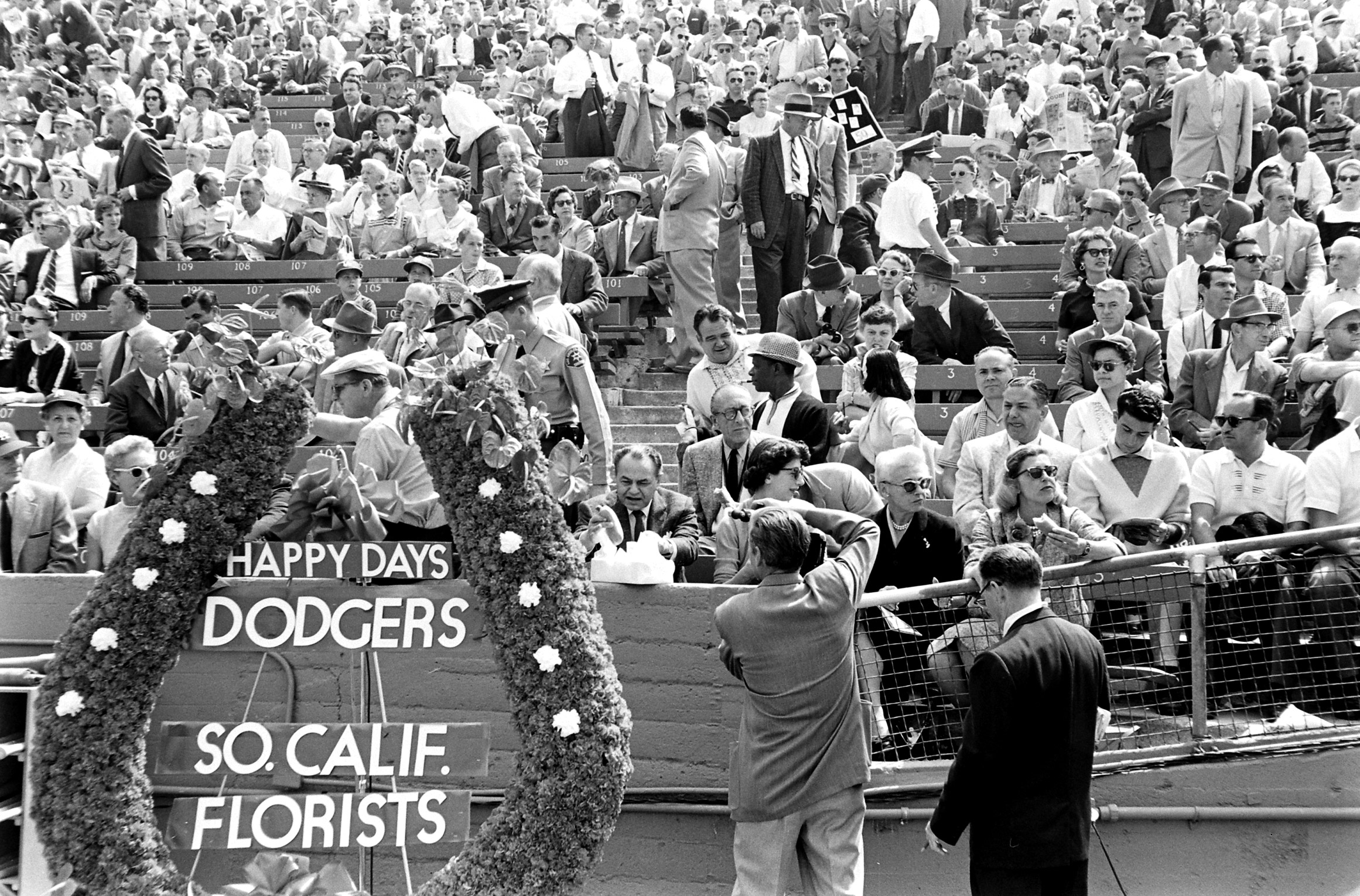 Fans at Dodgers opening day, Los Angeles, 1958.