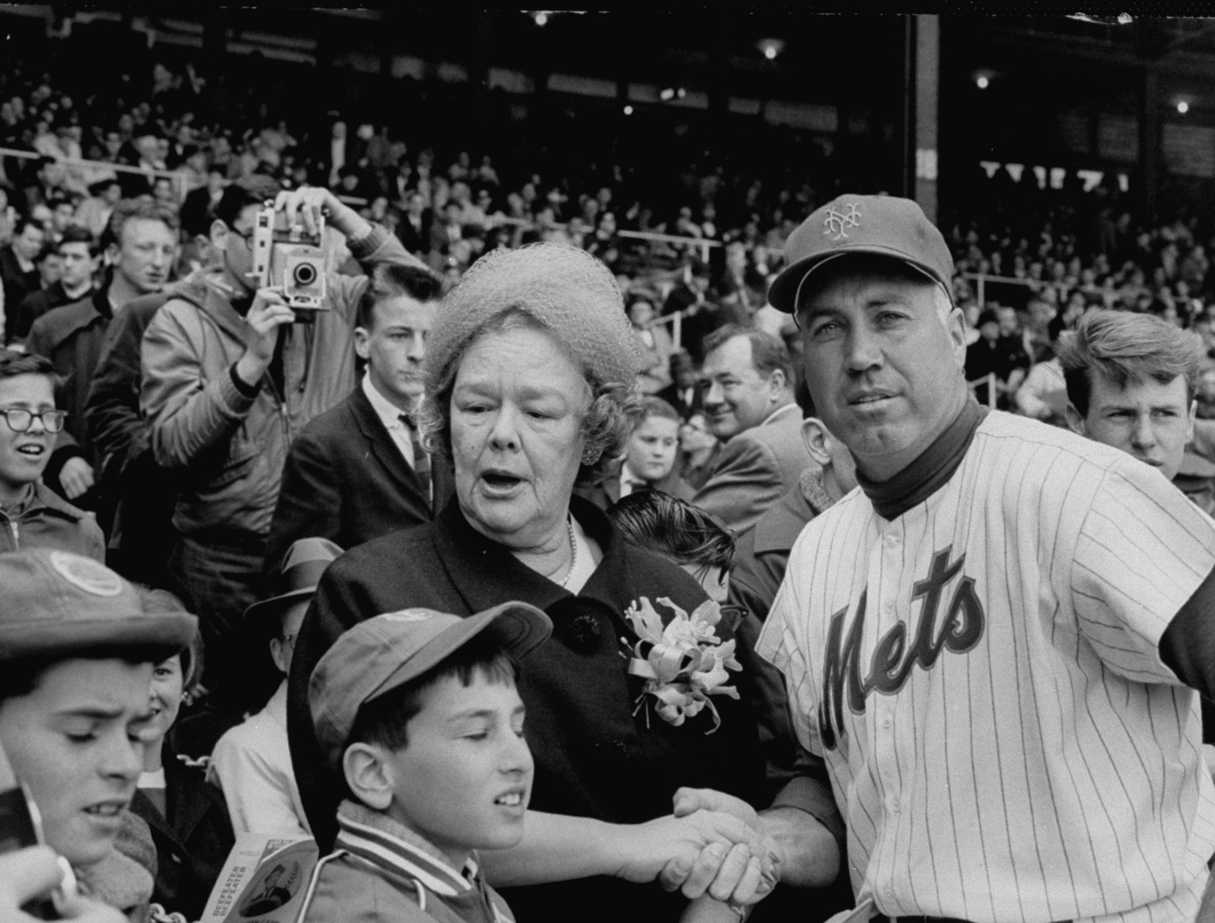 Owner of the Mets Mrs. Charles S. Paysom and player Duke Snider, on opening day at the Polo Grounds. 1963,