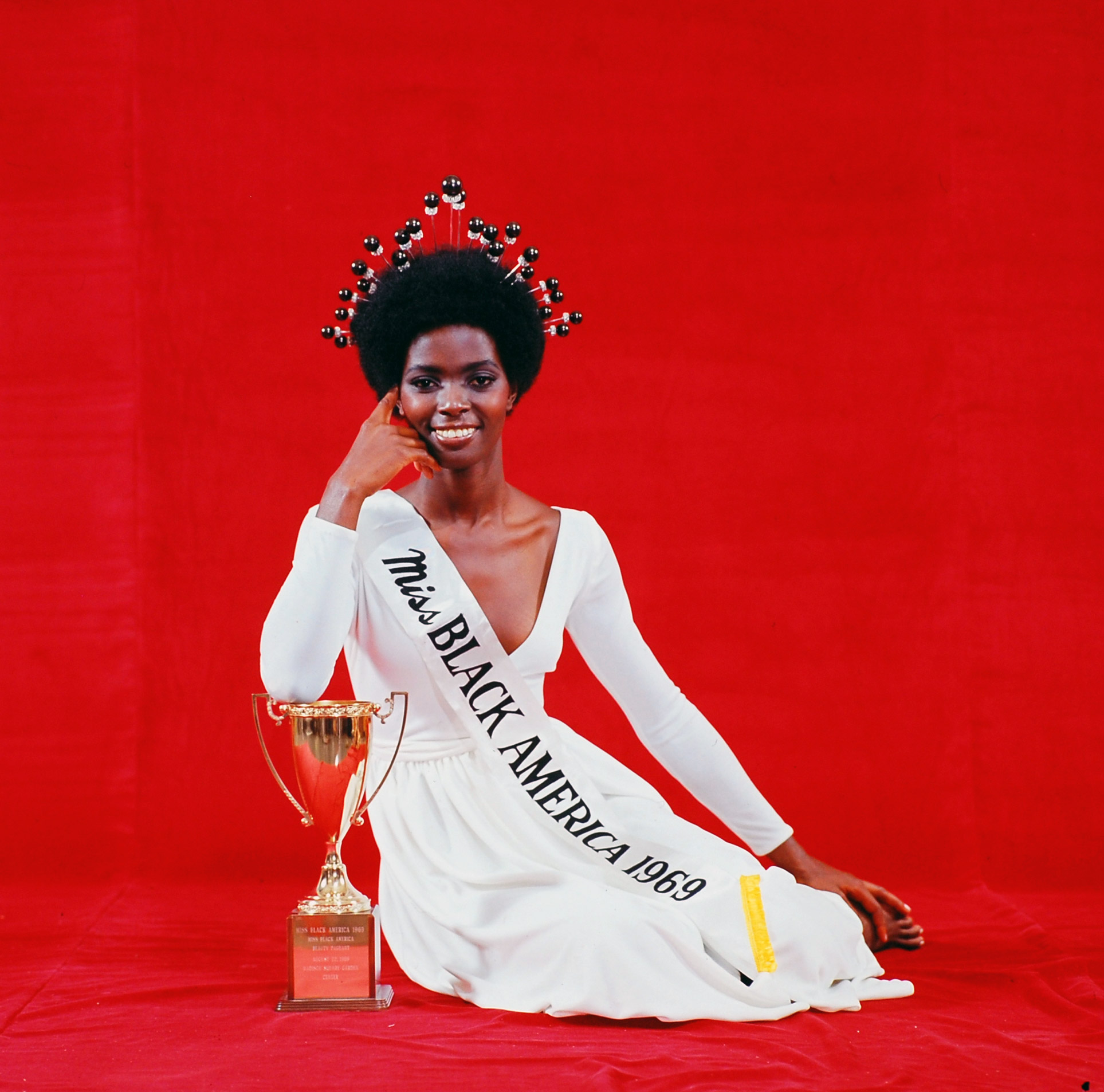 Professional model Gloria Smith wears the crown in which she was acclaimed winner of the 1969 Miss Black America contest in Madison Square Garden.