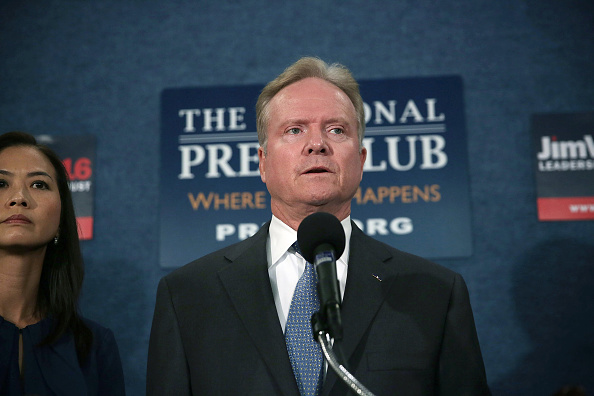 Former U.S. Sen. Jim Webb (D-VA) speaks as his wife Hong Le Webb listens during a news conference at the National Press Club October 20, 2015 in Washington, DC. Alex Wong—Getty Images (Alex Wong—Getty Images)
