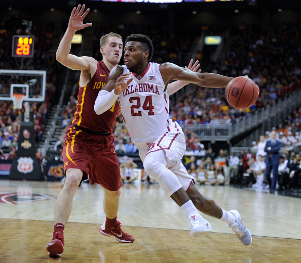 Buddy Hield (#24) of Oklahoma drives to the basket against Iowa State during the quarterfinals of the Big 12 Basketball Tournament in Kansas City, Missouri on March 10, 2016. (Ed Zurga—Getty Images)