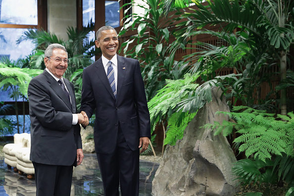 U.S. President Barack Obama (R) and Cuban President Raul Castro pose for photographs after greeting one another at the Palace of the Revolution March 21, 2016 in Havana, Cuba. The first sitting U.S. president to visit Cuba in 88 years, Obama and Castro will sit down for bilateral talks and will deliver joint statements to the news media. Chip Somodevilla—Getty Images (Chip Somodevilla—Getty Images)