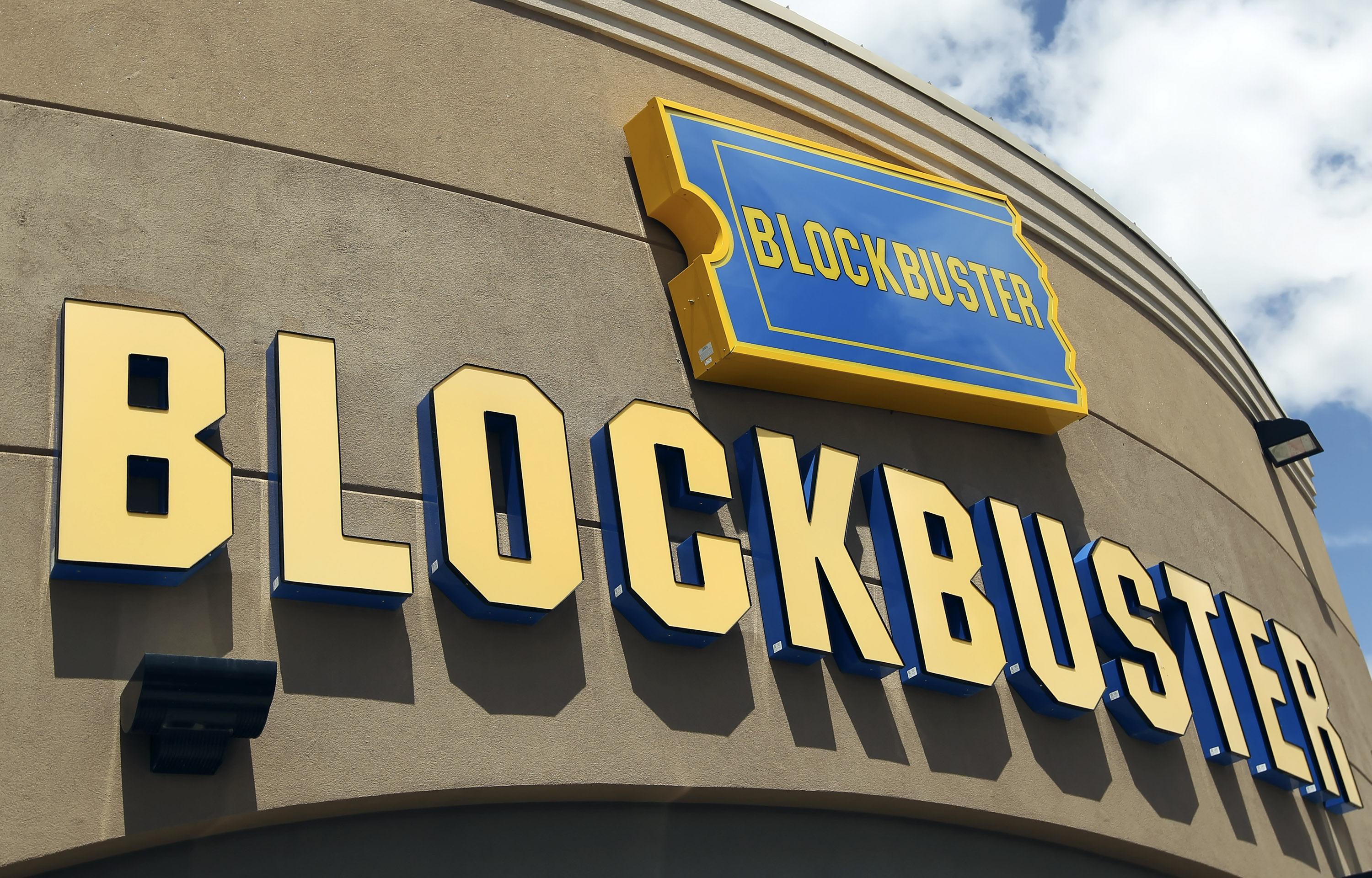 Signage hangs outside a Blockbuster store in Salt Lake City, Utah, U.S., on Wednesday, May 12, 2010. (George Frey—Bloomberg/Getty Images)