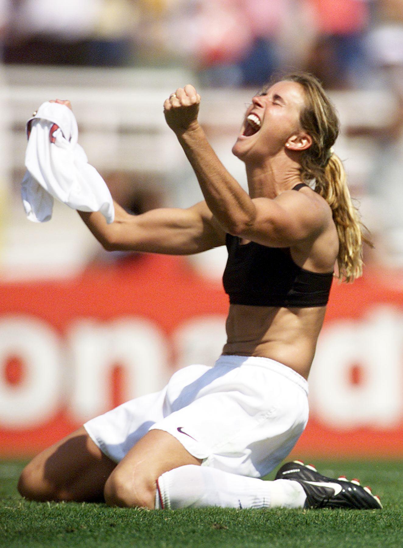 Brandi Chastain celebrates after kicking the winning penalty shot to win the 1999 Women's World Cup final against China on July 10, 1999 at the Rose Bowl in Pasadena. (Roberto Schmidt—AFP/Getty Images)