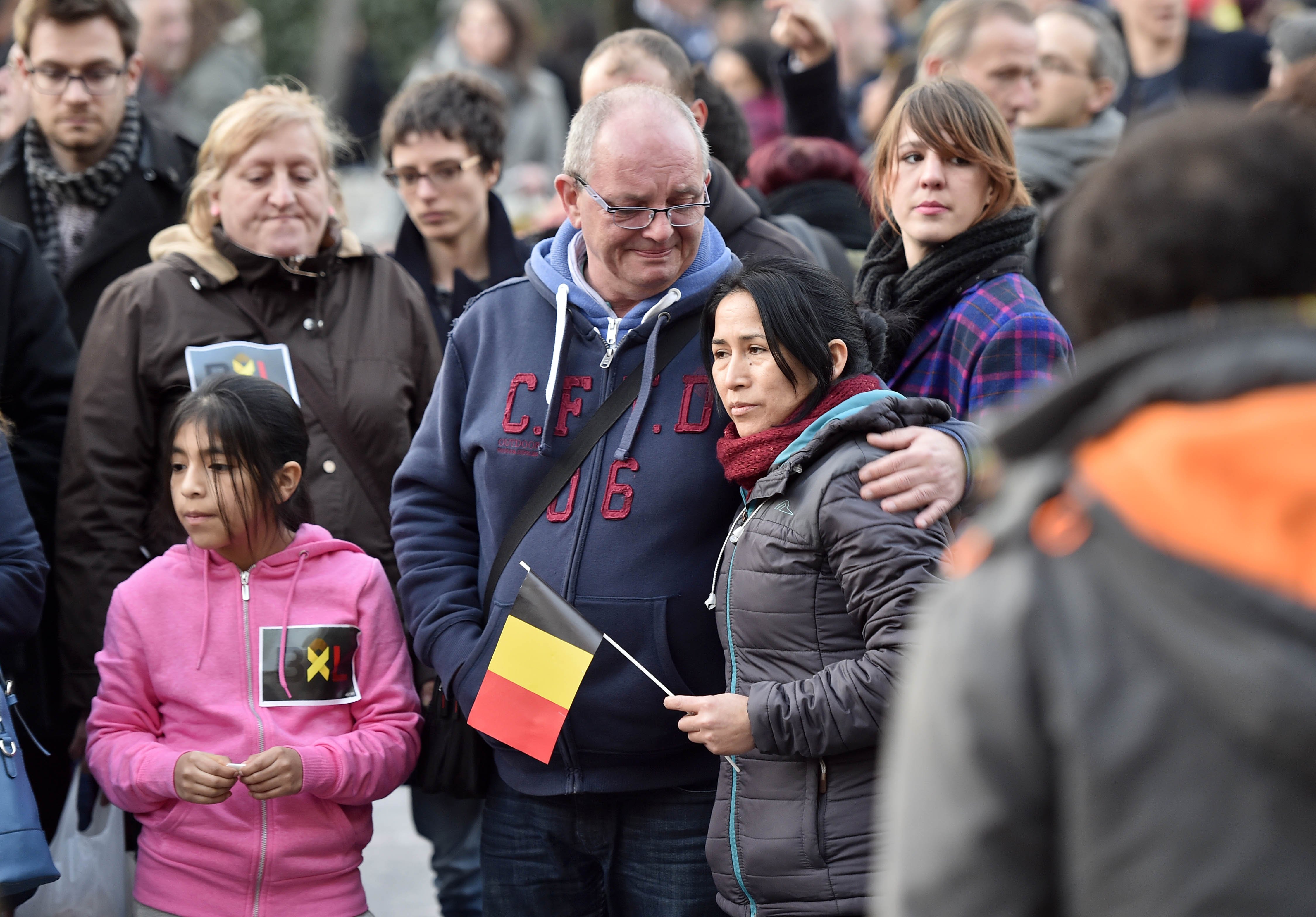 People mourn for the victims at Place de la Bourse in the center of Brussels, on March 22, 2016. (Martin Meissner—AP)