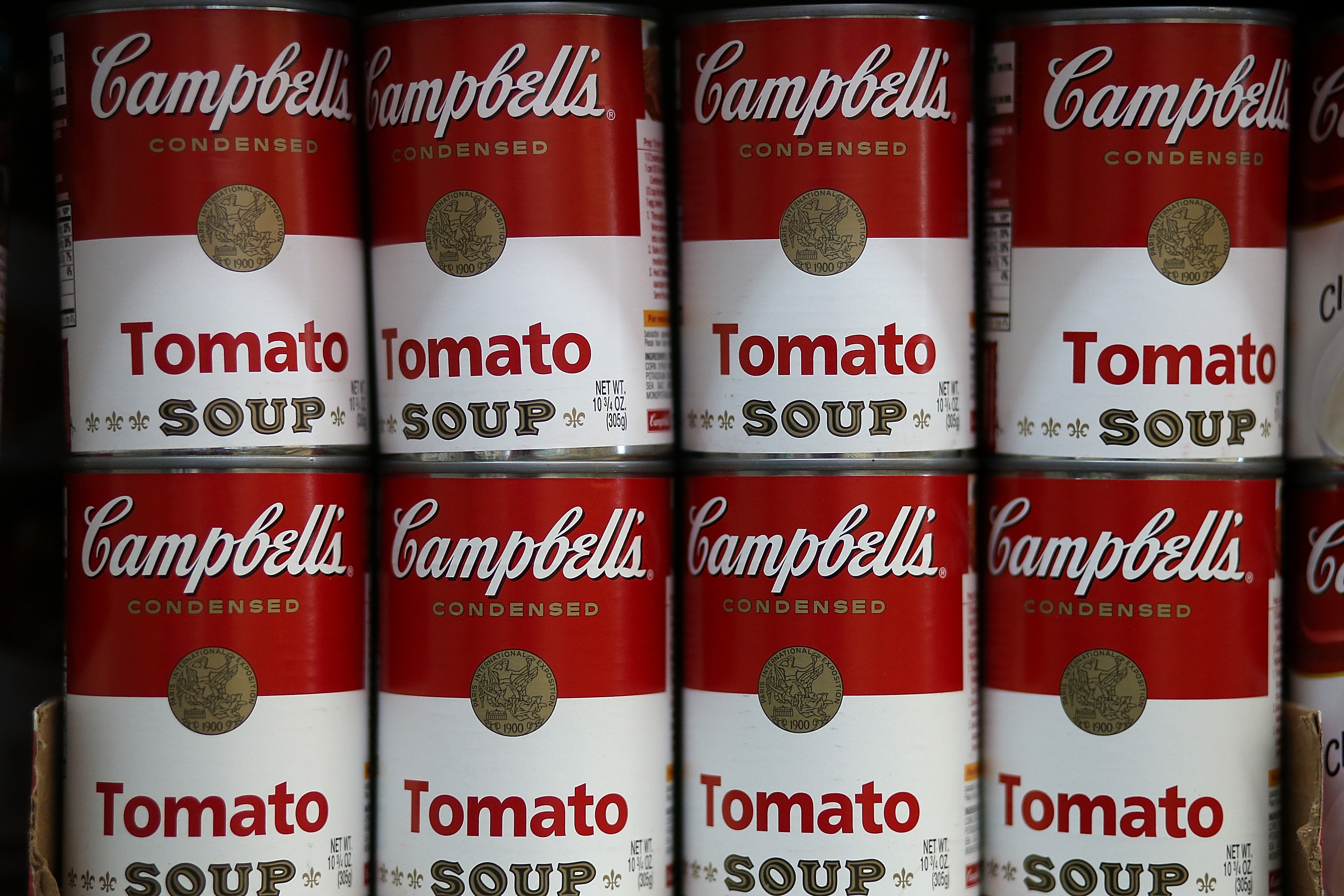 Cans of Campbell's tomato soup are displayed on a shelf at Santa Venetia Market on May 20, 2013 in San Rafael, California.