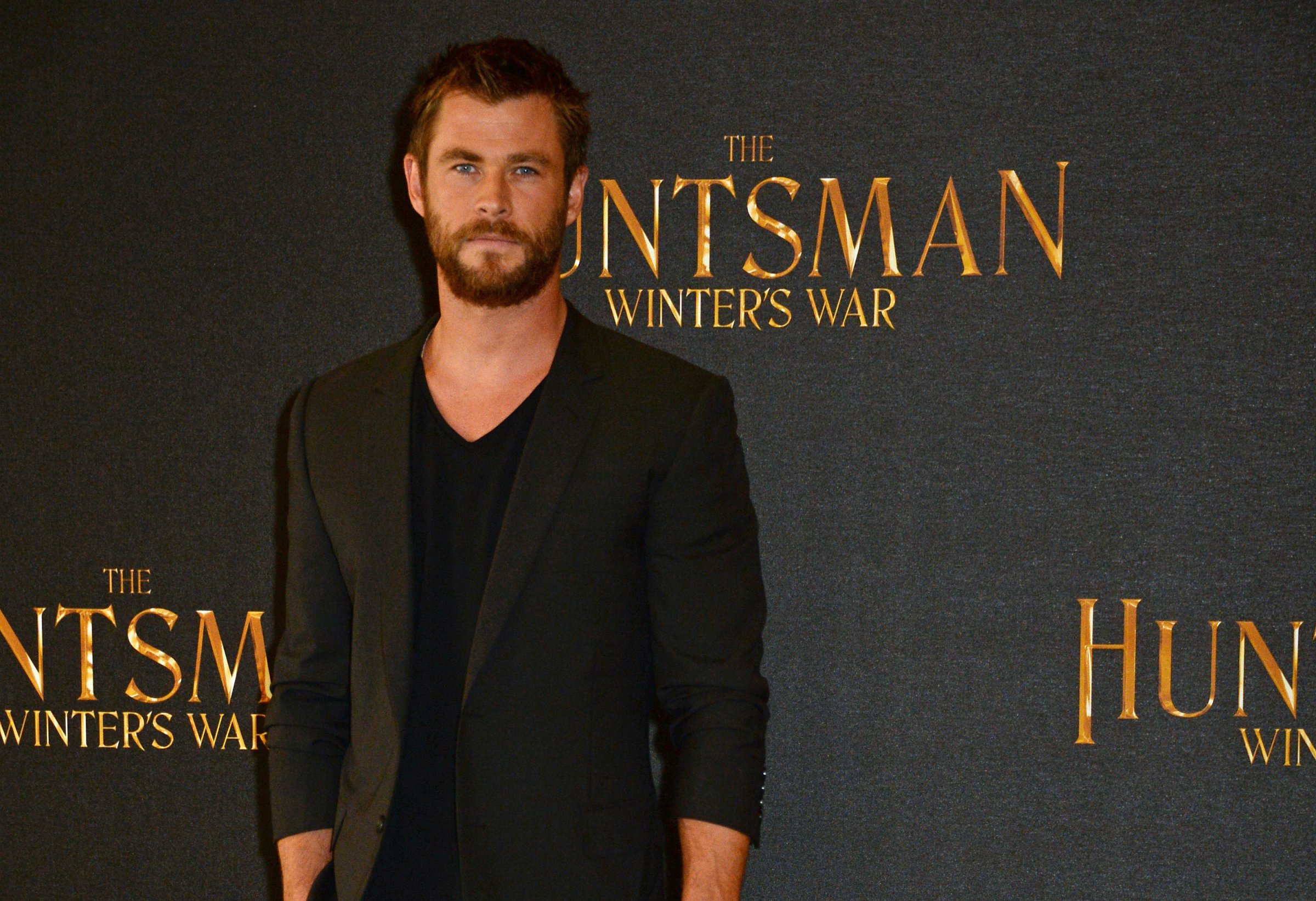 Chris Hemsworth poses at a photocall for 'The Huntsman: Winter's War' at Claridges Hotel on March 31, 2016 in London, England.