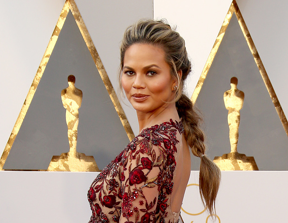 Model Chrissy Teigen attends the 88th Annual Academy Awards at Hollywood & Highland Center on February 28, 2016 in Hollywood, California.