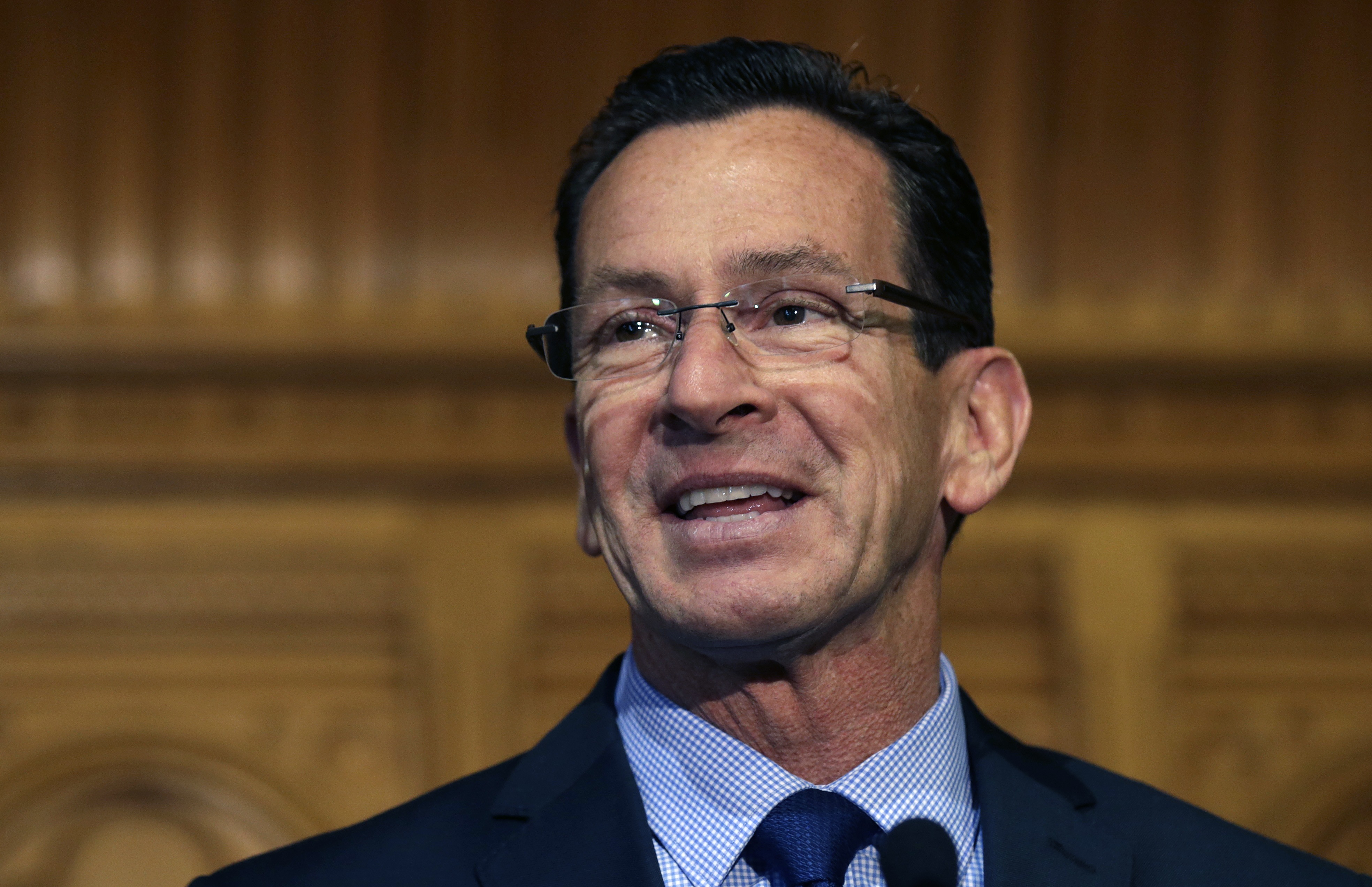 Dannel Malloy smiles as he thanks supporters at the State House in Hartford, CT, on Nov. 5, 2014. (Charles Krupa—AP)