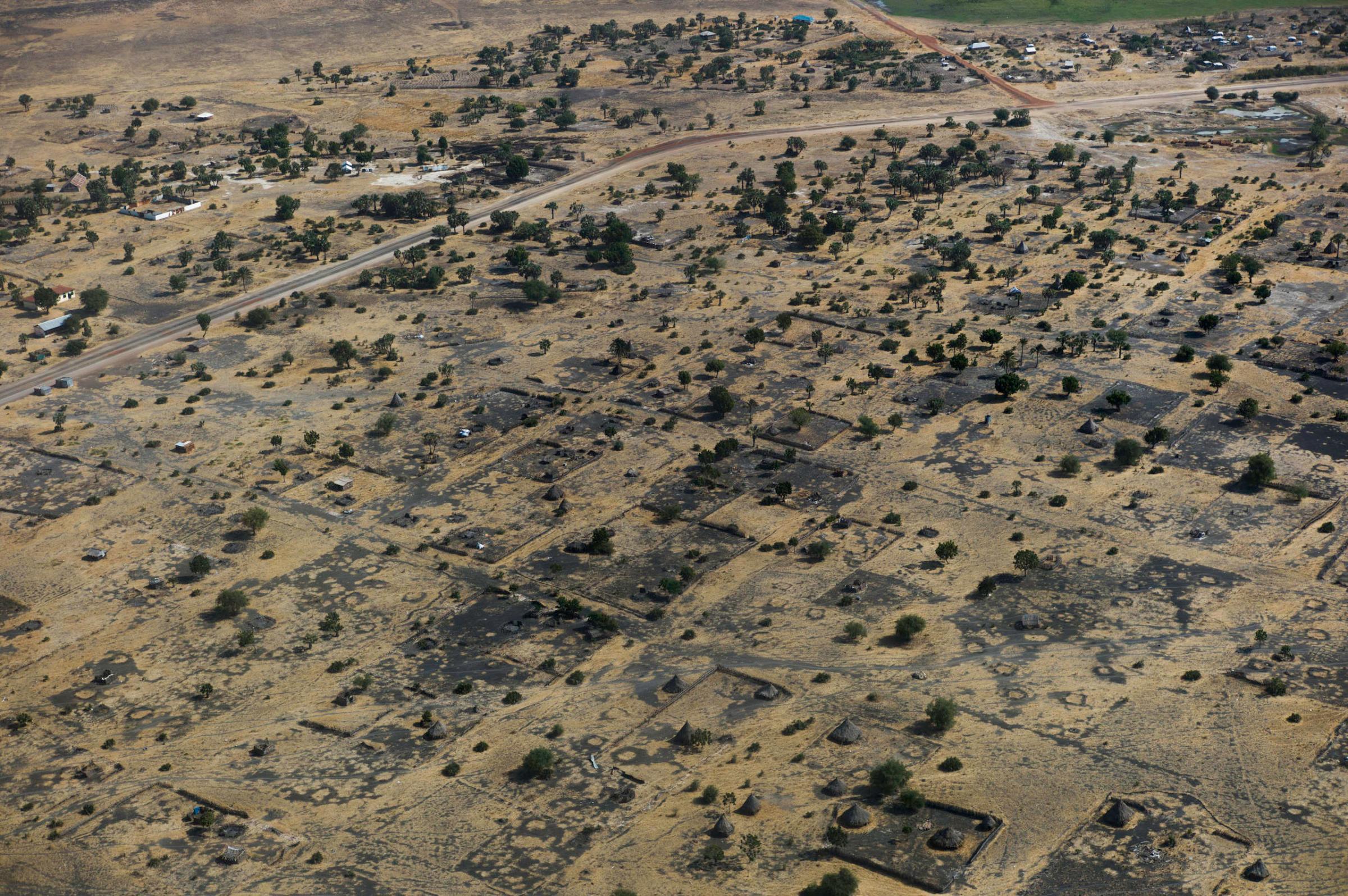 An aerial view of the empty and completely destroyed town of Leer, Unity State, South Sudan.