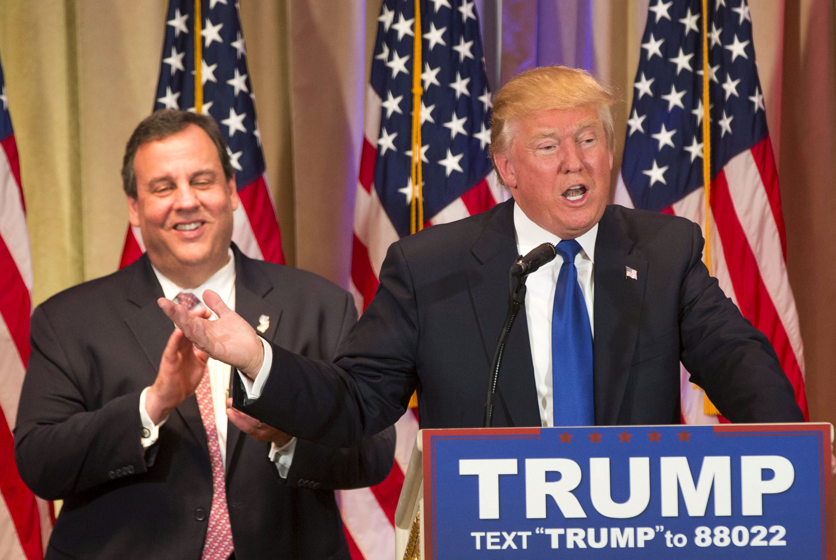 Republican 2016 US presidential candidate businessman Donald Trump (R) speaks, after being introduced by New Jersey Governor Chris Christie (L) at a Super Tuesday campaign event in Palm Beach, Florida, USA, 01 March 2016. The Florida presidential primary is 15 March 2016. EPA/RYAN STONE (RYAN STONE—)