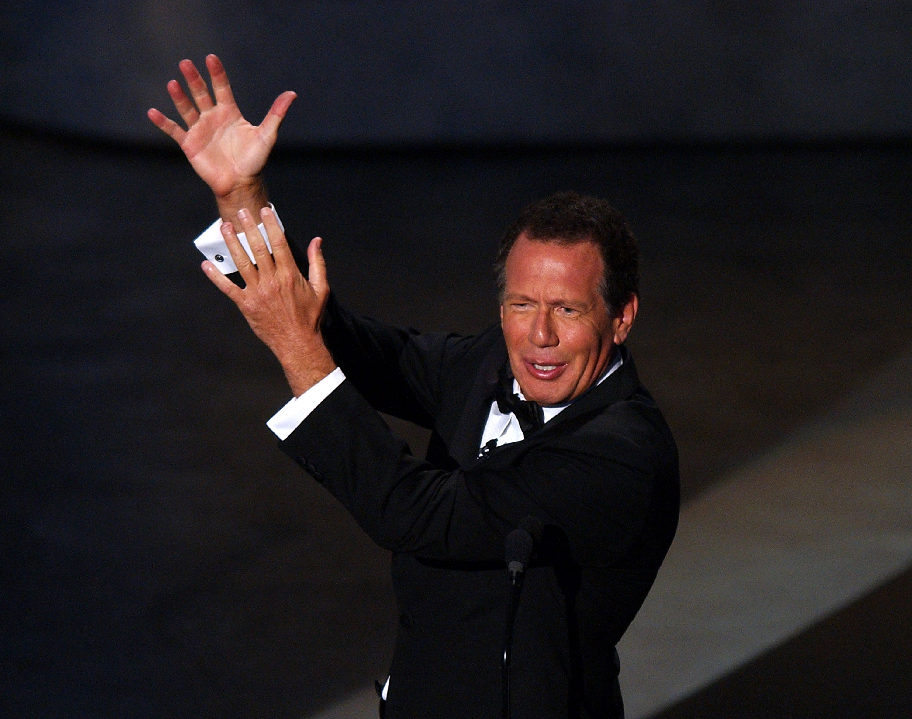 Garry Shandling, who died Mar. 24,  hosting the 56th Annual Primetime Emmy Awards in 2004 (Michael Caulfield Archive—WireImage)