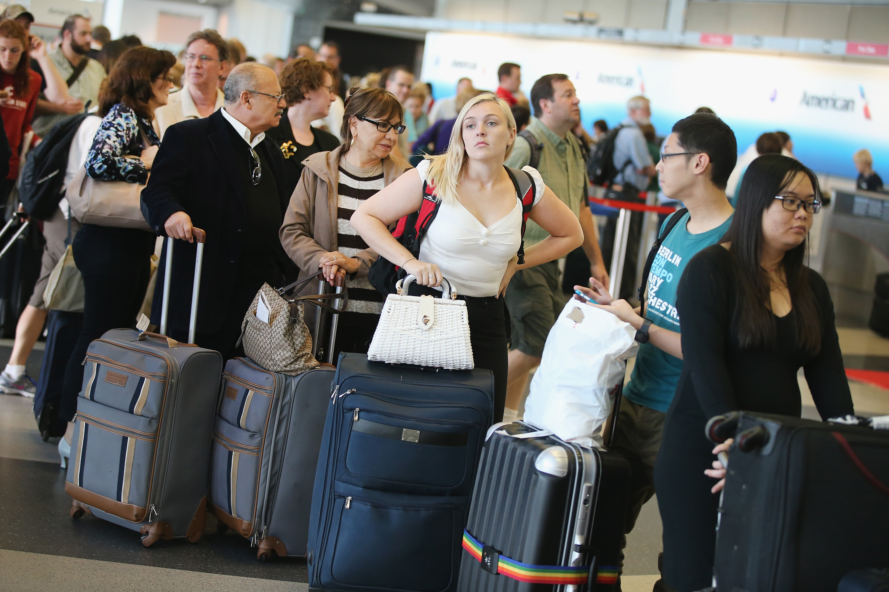 Passengers wait in line to reschedule flights at O'Hare International Airport on September 26, 2014 in Chicago, Illinois. (Scott Olson&mdash;Getty Images)
