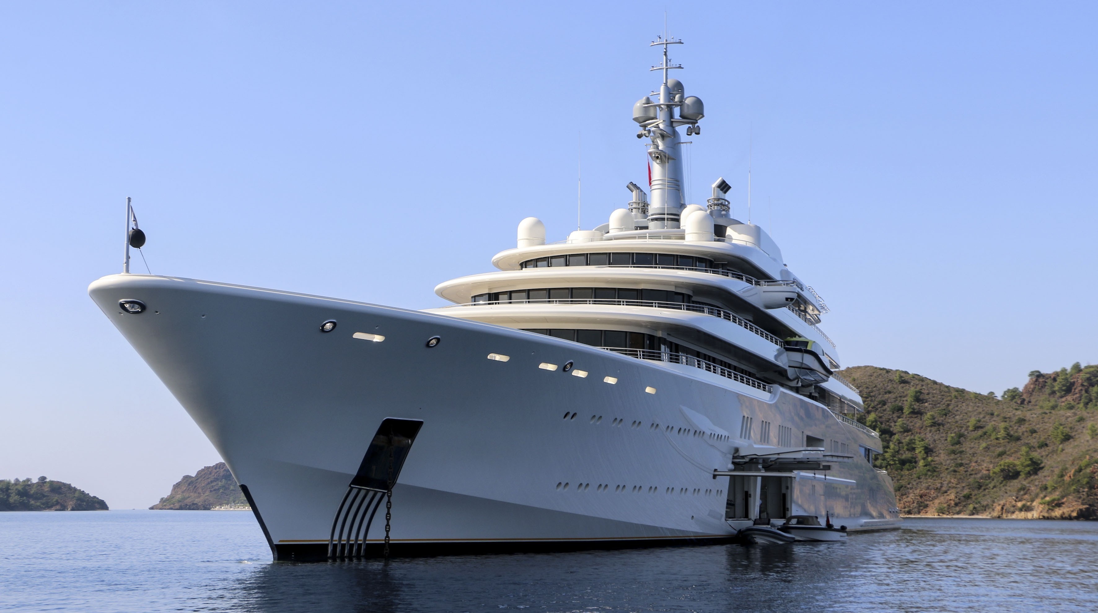 Eclipse, the private luxury yacht of Russian billionaire Roman Abramovich, anchors at Hisaronu Bay in Marmaris district of Mugla, southwestern Turkey on October 19, 2015. The 163-meter-long Eclipse, world's second largest private yacht, has two helicopter pads, 24 guest cabins, two swimming pools, a disco hall, a movie theater and two mini-submarines. (Anadolu Agency&mdash;Getty Images)