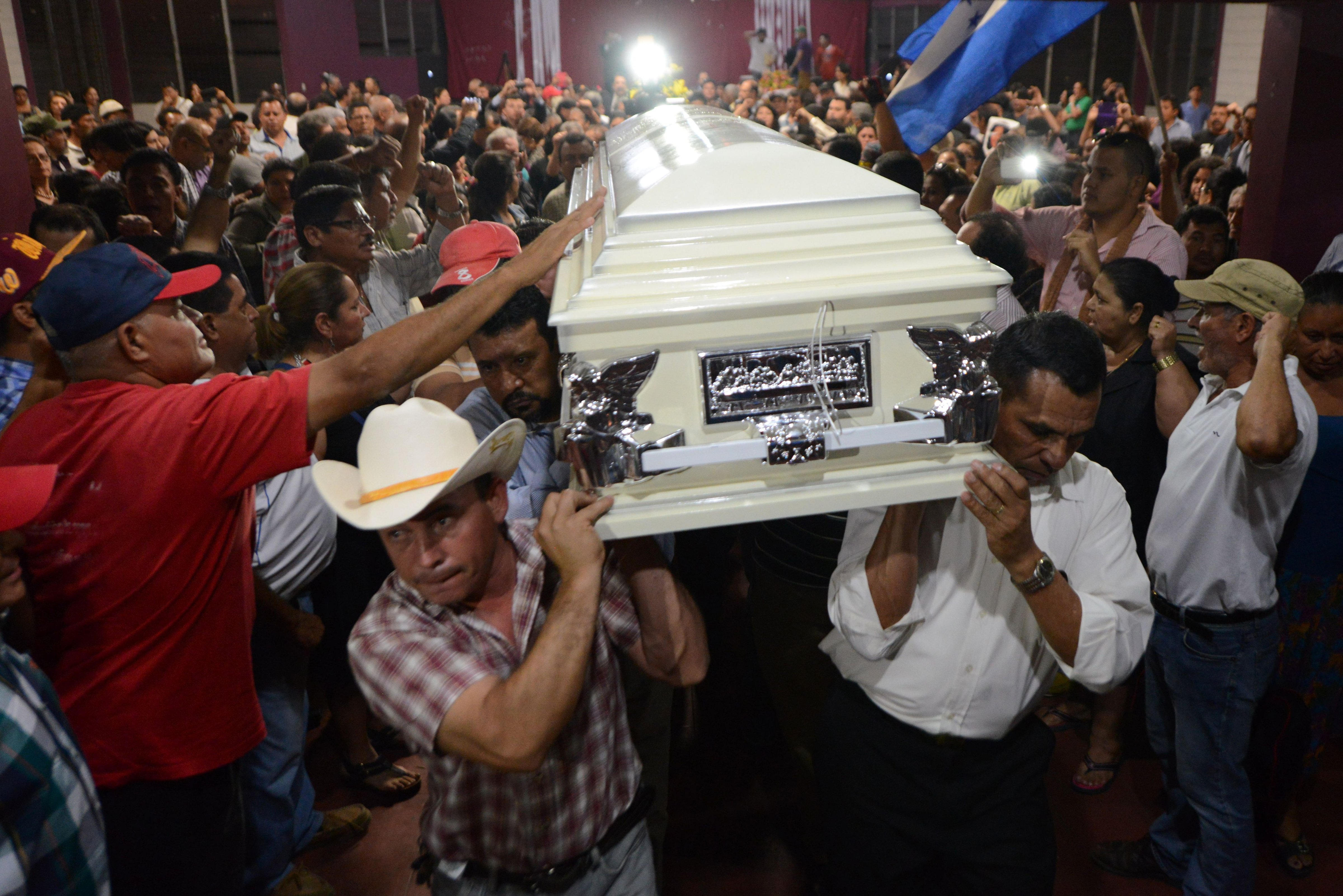 Relatives and friends carry the coffin of murdered indigenous activist Berta C&aacute;ceres during her funeral in La Esperanza, Honduras, on March 3, 2016 (Orlando Sierra—AFP/Getty Images)