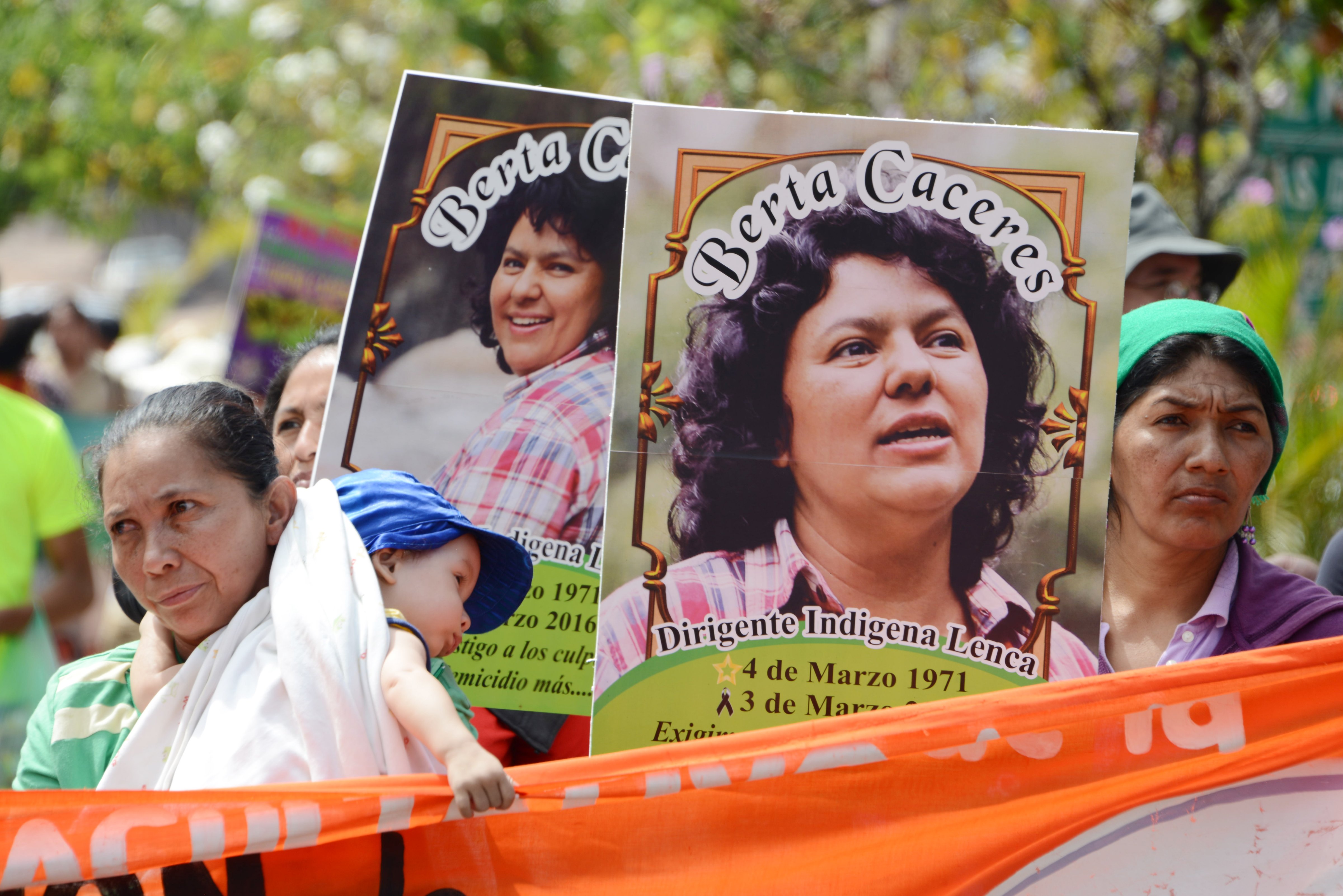 Slain Honduran environmentalist Berta Caceres posters are carried  during a International Women's day demonstration in Tegucigalpa on March 08, 2016 (Orlando Sierra—AFP/Getty Images)