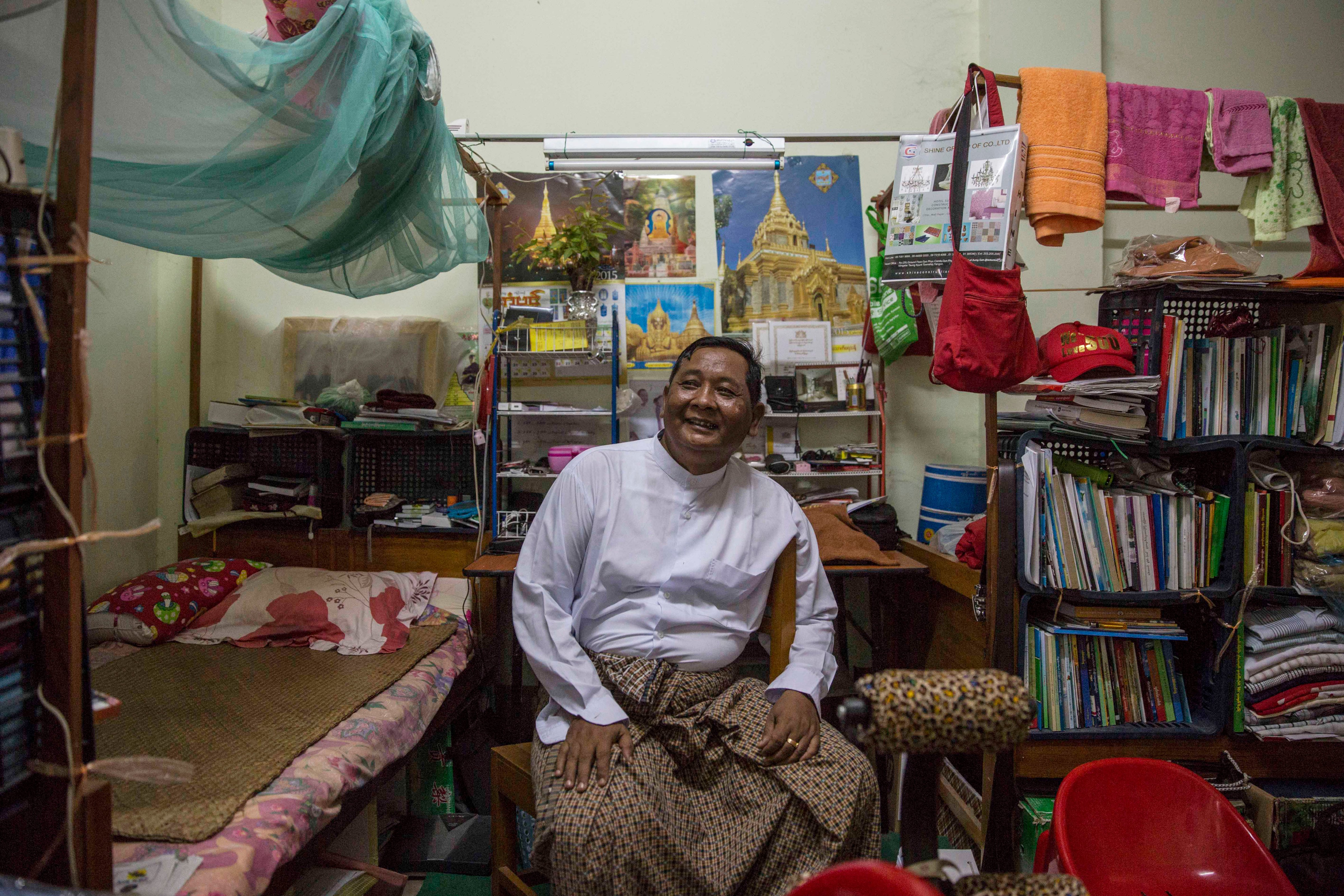 An NLD member of parliament sits in his dormitory room at the Sibin Guesthouse on March 9, 2016, in Naypyidaw, Burma (Lauren DeCicca—Getty Images)