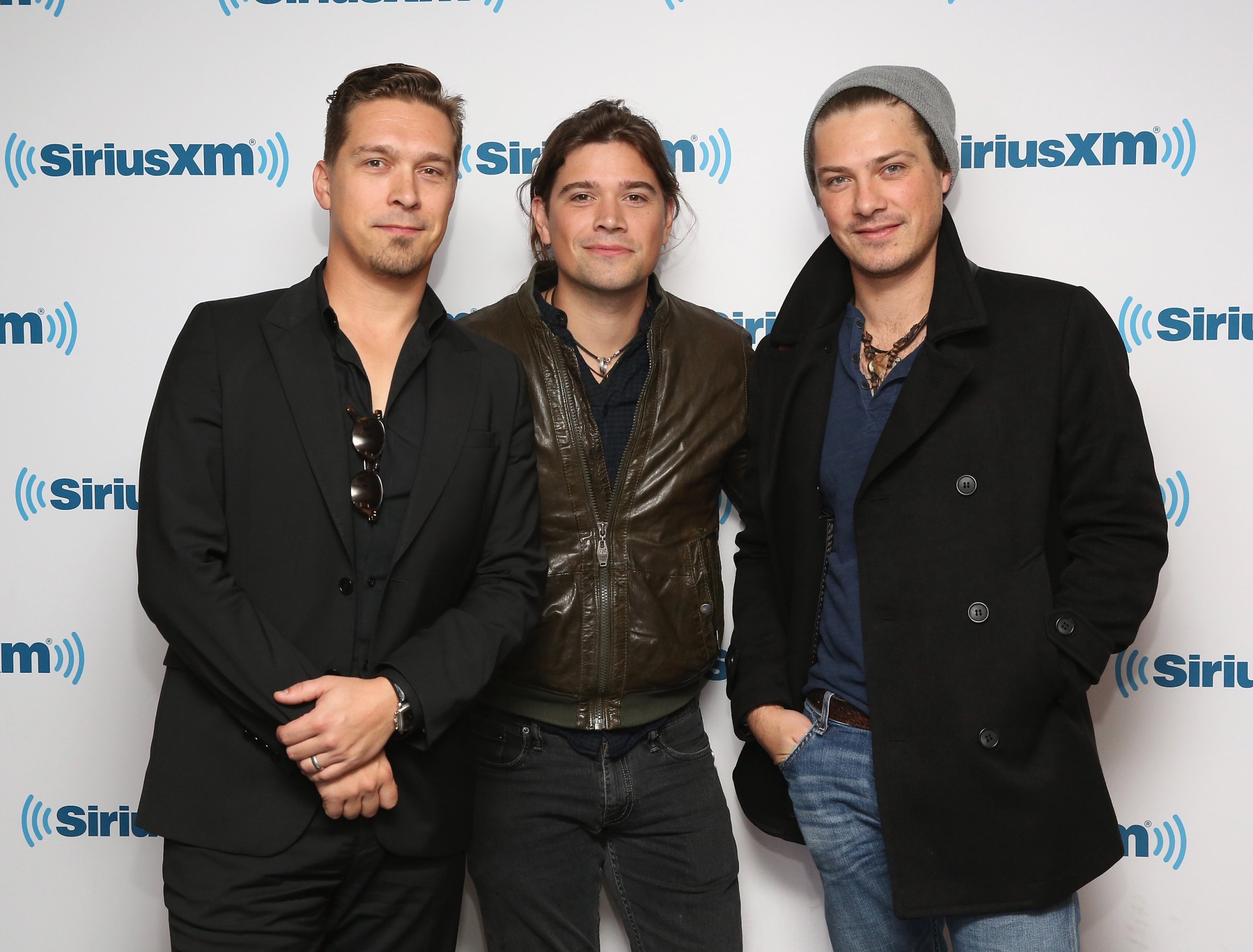 Isaac Hanson, Zac Hanson and Taylor Hanson of Hanson visit at SiriusXM Studios on October 16, 2015 in New York City.