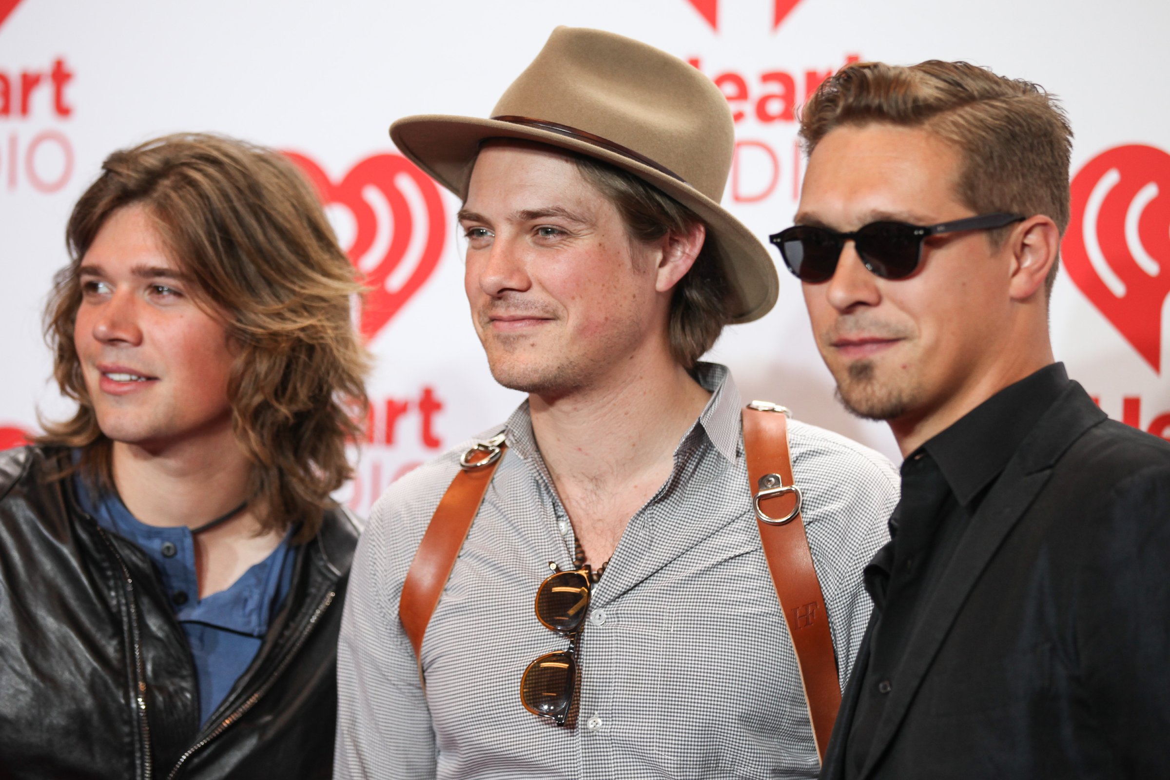 Zac Hanson, Taylor Hanson and Isaac Hanson of Hanson pose in the iHeartRadio music festival photo room on September 21, 2013 in Las Vegas, Nevada.