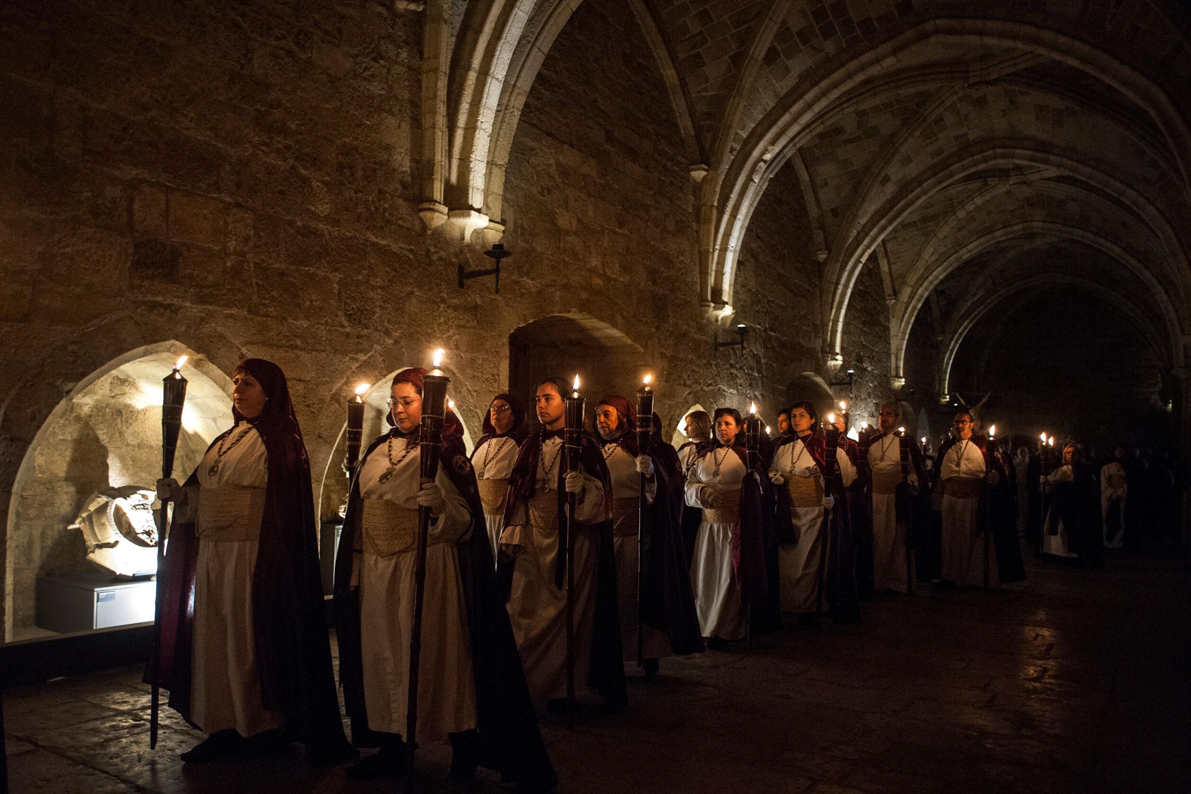 Participants in the procession of the Holy Christ of Peace celebrate on the night of Holy Thursday in Santander, Spain, March 24, 2016.