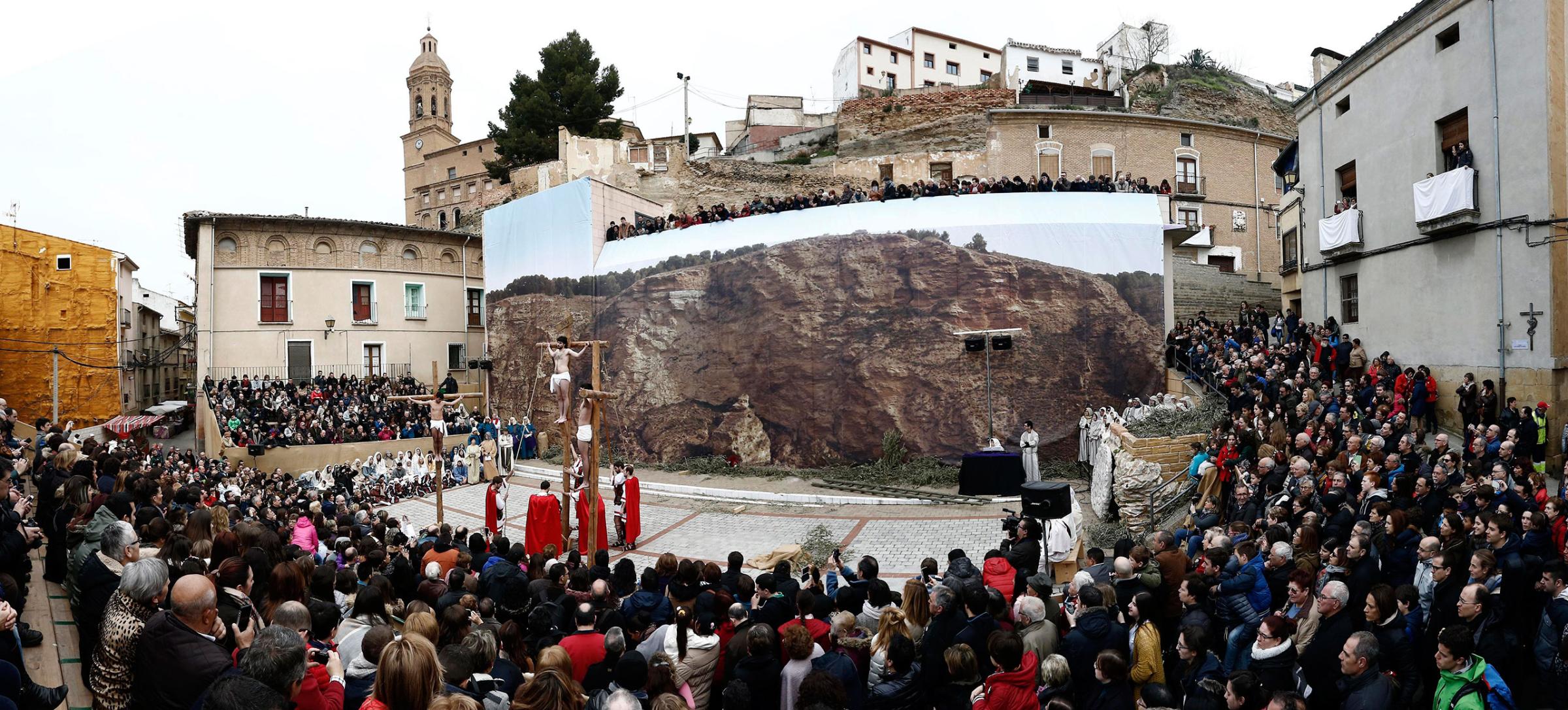 Penitents take part in the reenactment of the viacrucis at Andosilla in Navarra, Spain, March 25, 2016.