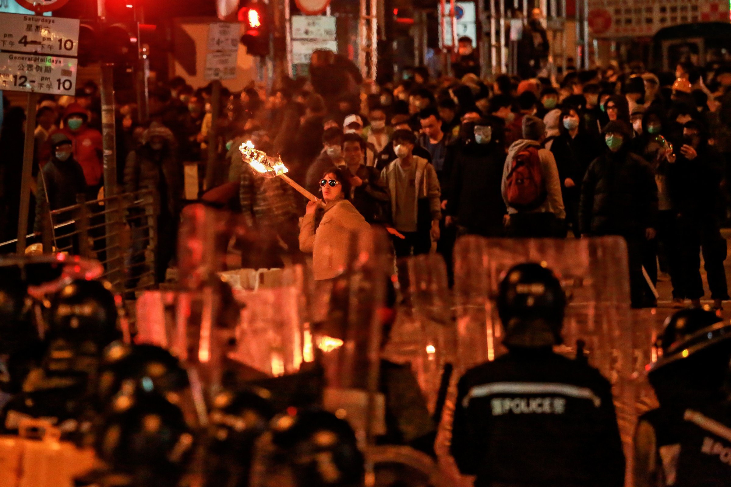 In a rare violent night, protesters confront police Feb. 9 in the Hong Kong district of Mong Kok