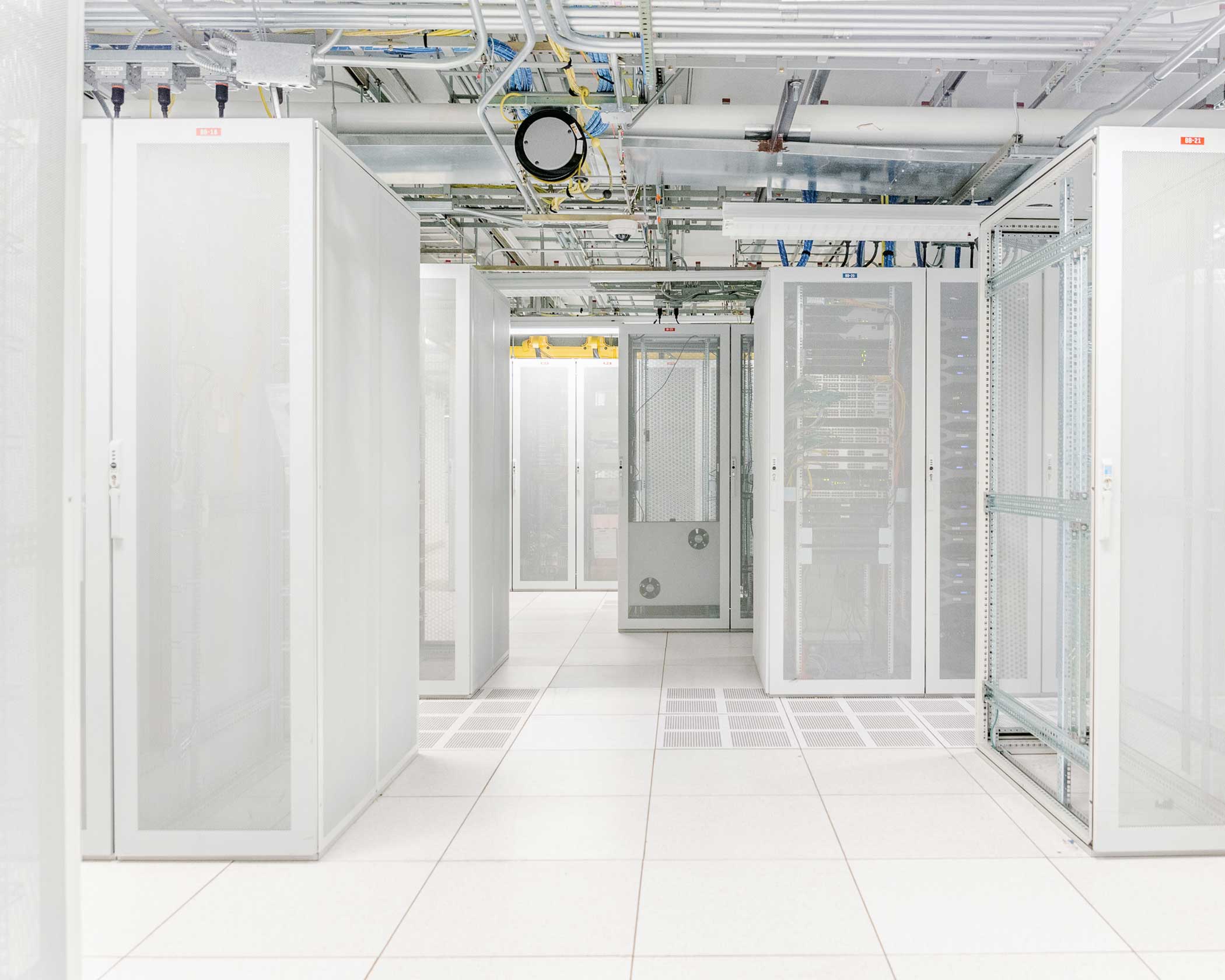 Servers racks inside a peering exchange at 85 10th Ave., where large networks exchange traffic with others when a mutual benefit exists. These facilities are  carrier neutral  so that any carrier can exchange traffic with another- a policy which and makes peering efficient.