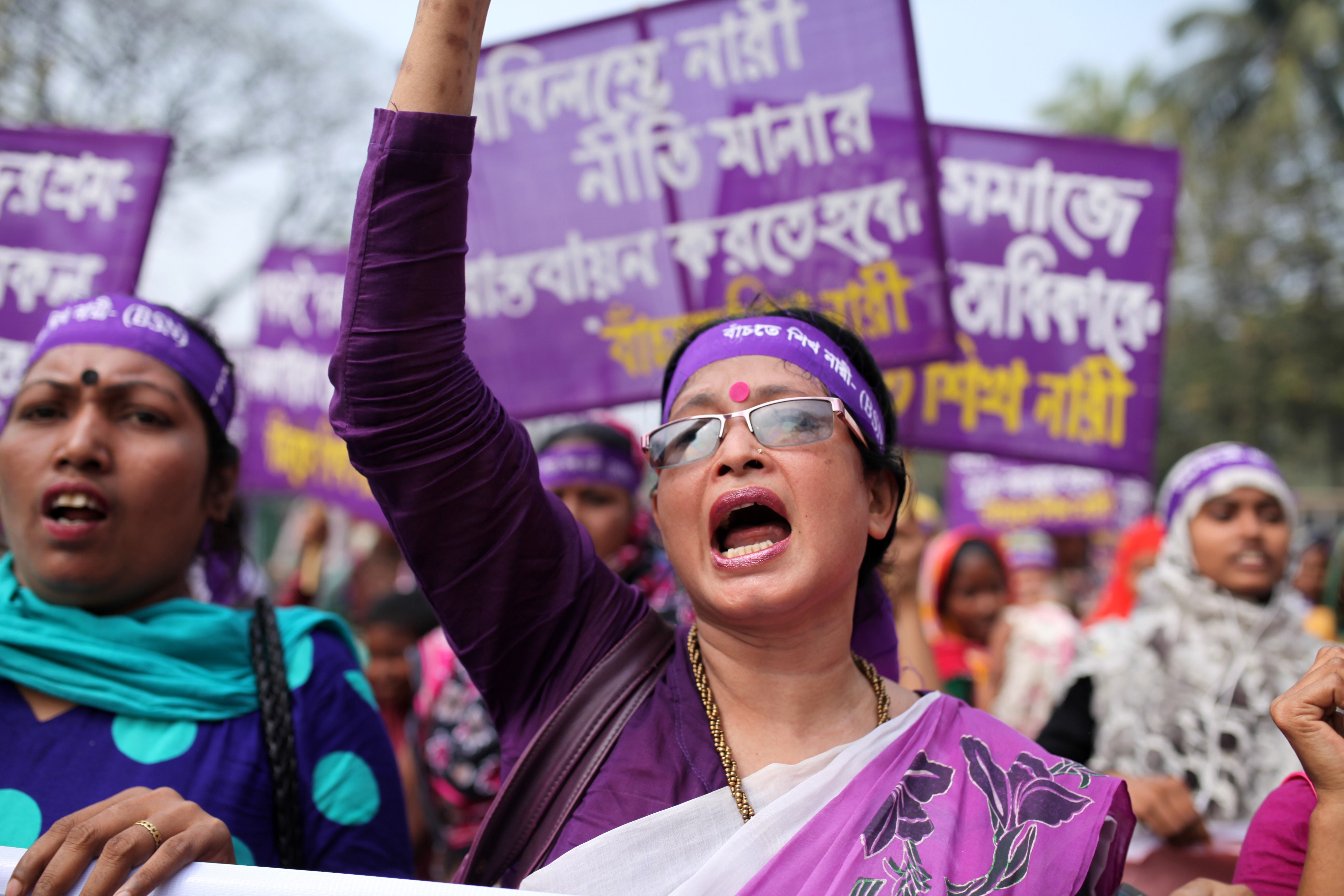 Bangladeshi activists and garment workers attend a rally in front of National Press Club during International Women's Day in Dhaka, Bangladesh on March 08, 2016. (Zakir Hossain Chowdrey—Anadolu Agency/Getty Images)